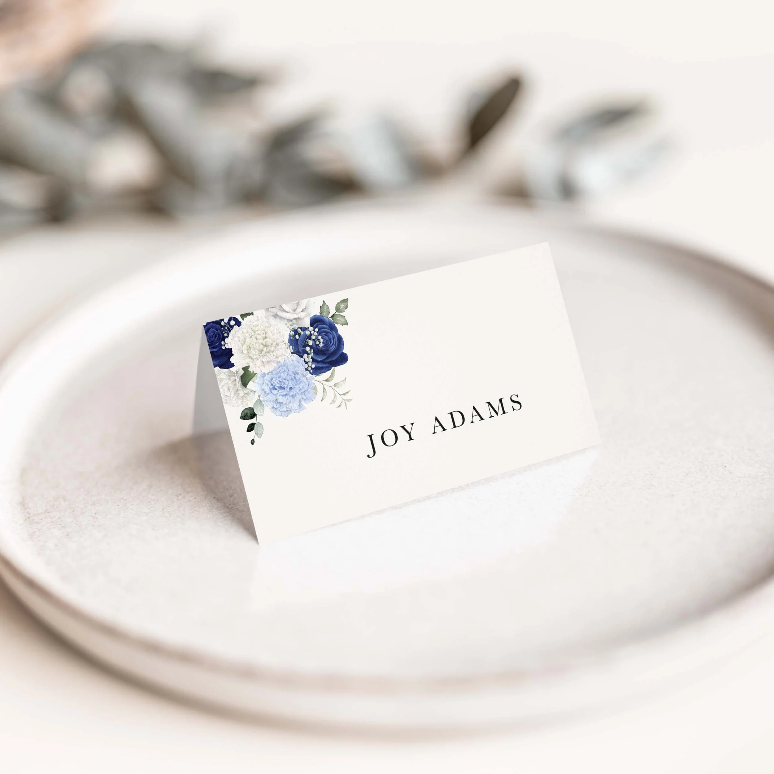 Blue floral wedding place card with corner detail