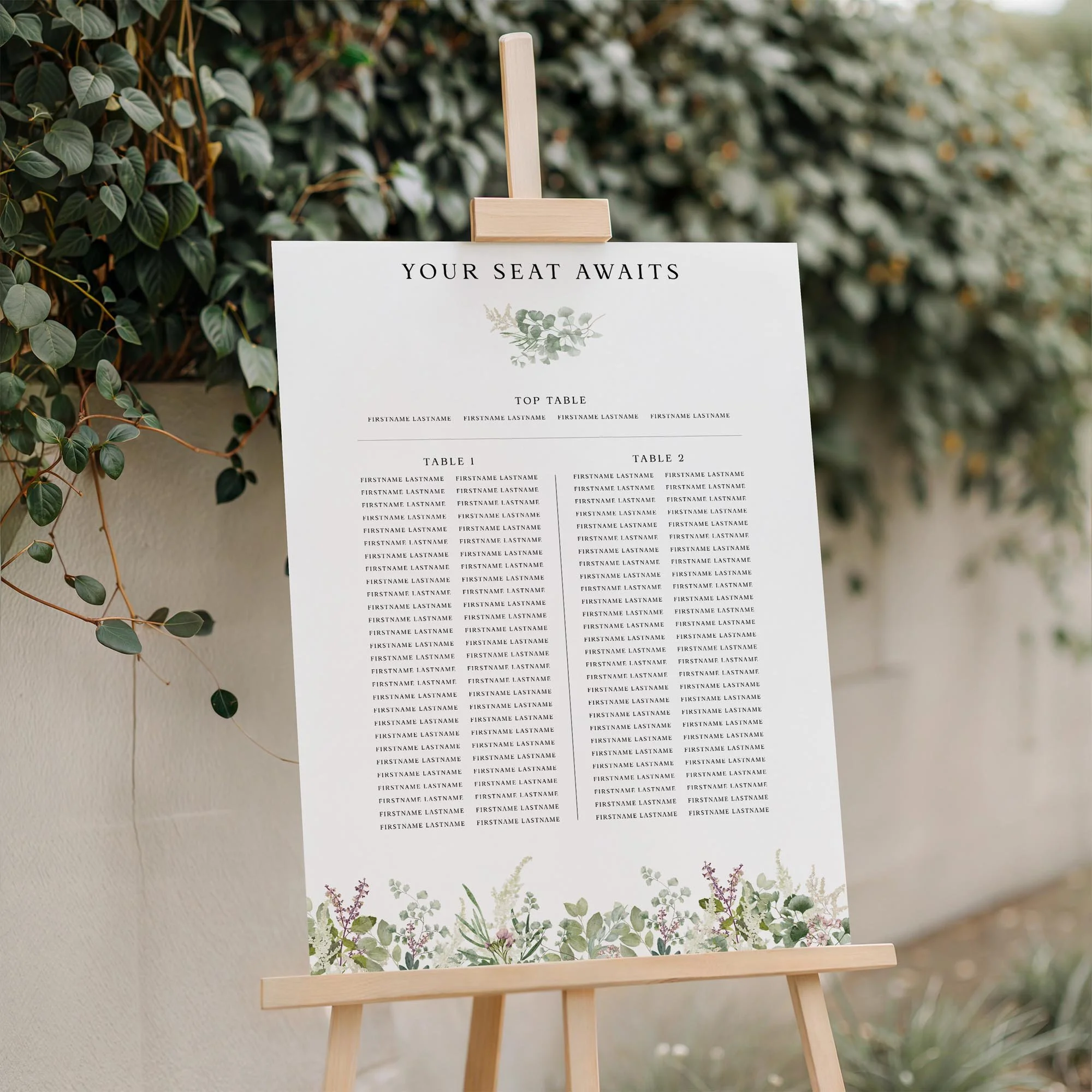 Close-up of the Forest Trestle Table wedding seating plan board displayed outdoors