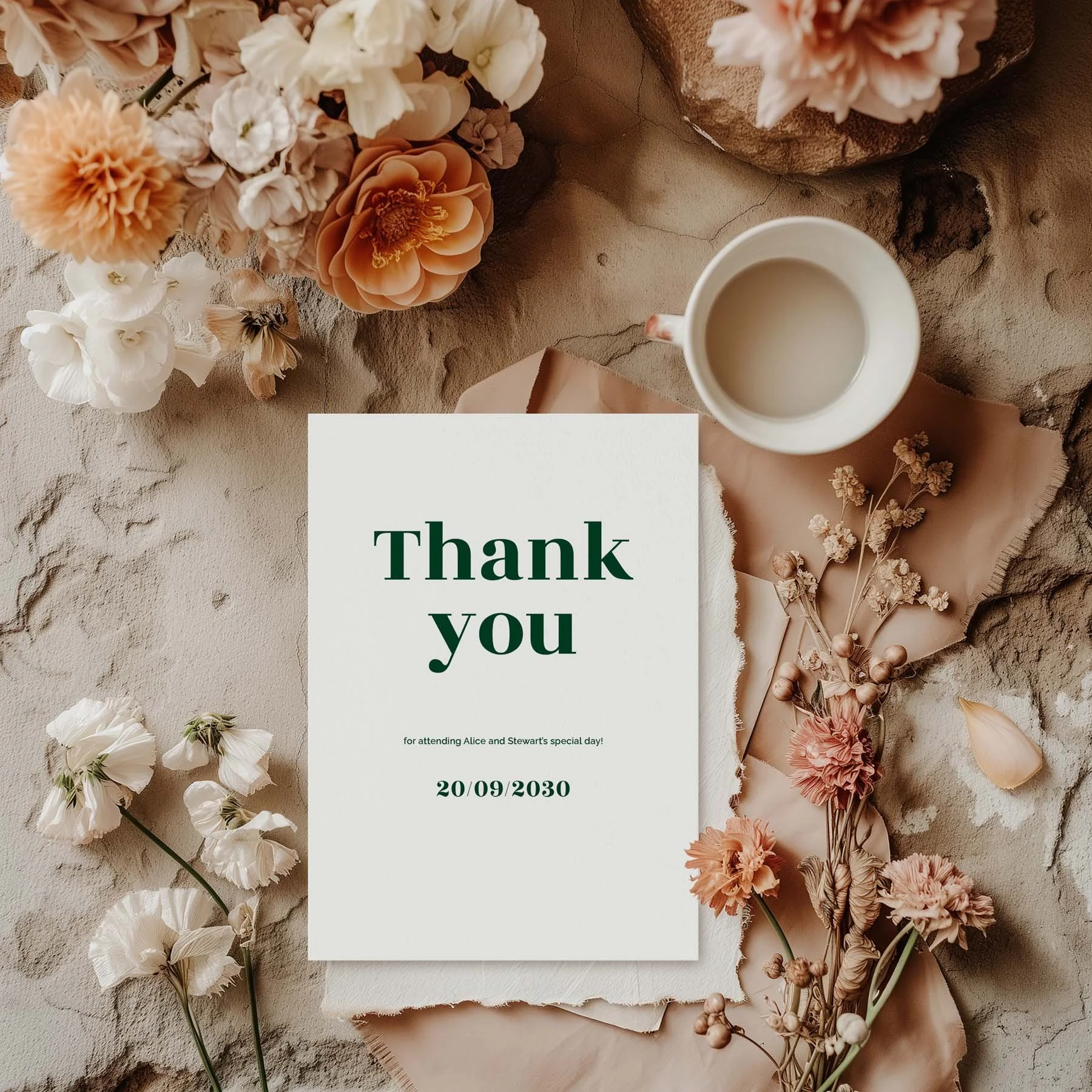 Typography wedding thank you card styled with flowers and stationery details