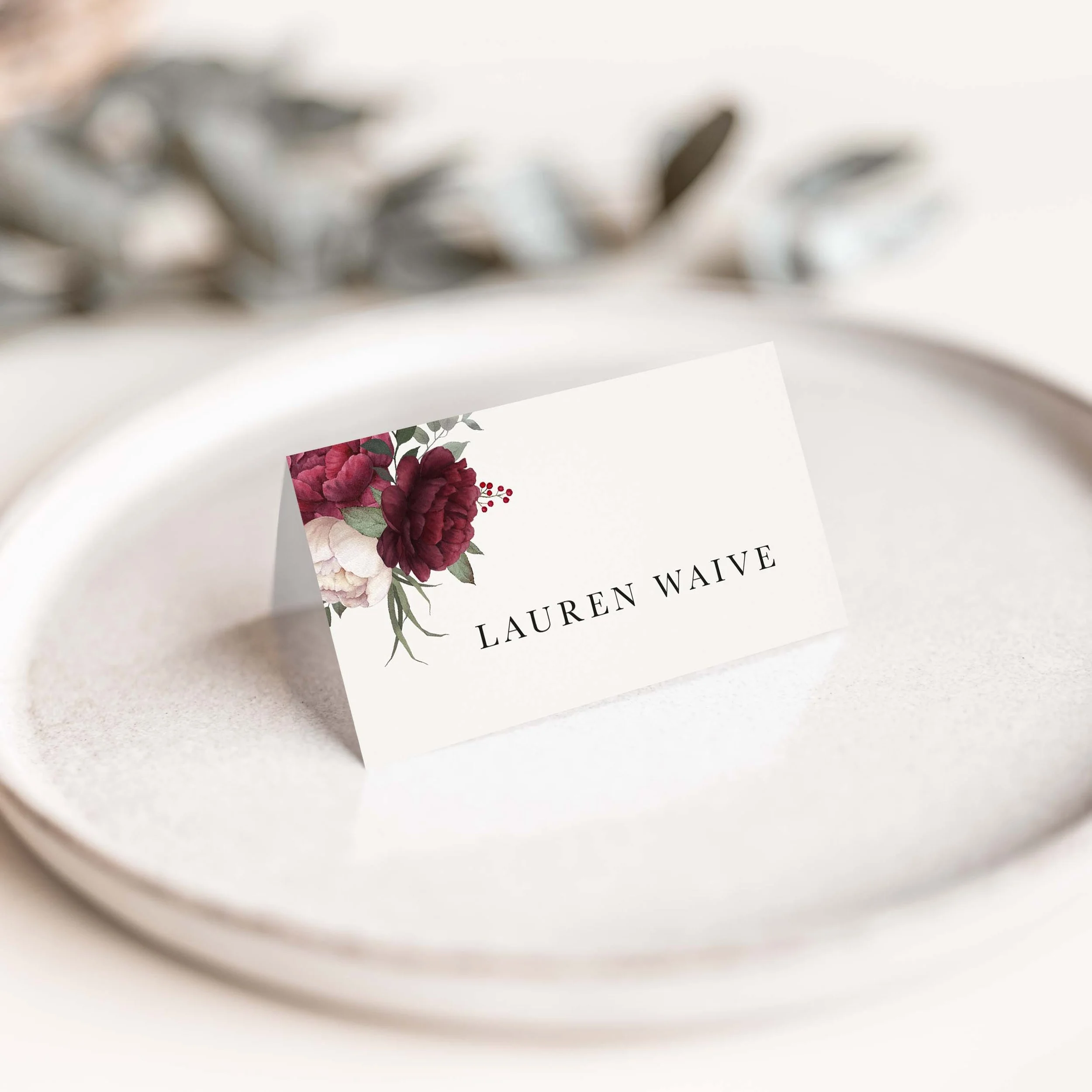 Romantic wedding place card with deep floral corner detail