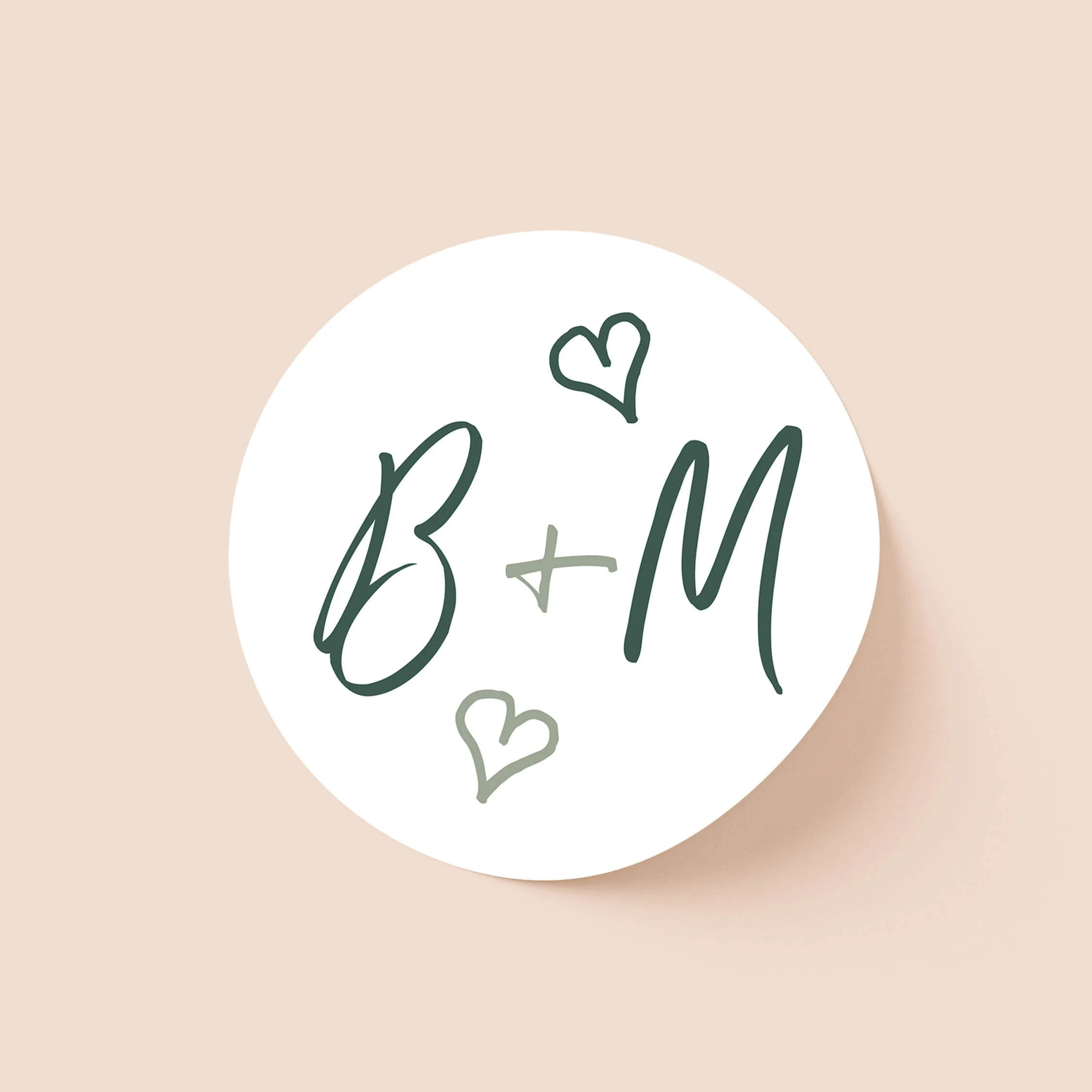 Whimsical Green personalised wedding sticker with bold green script initials and hand-drawn green hearts on round sticker