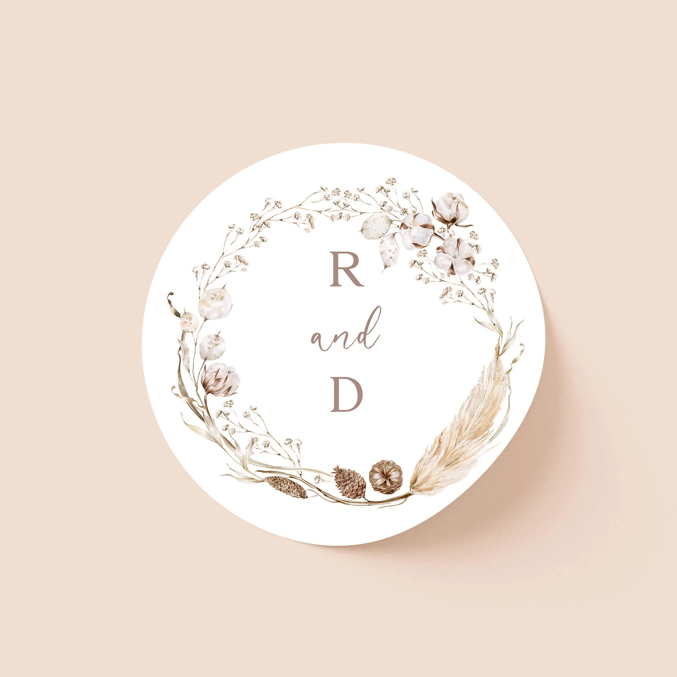 Boho wedding sticker with neutral botanical wreath and initials on round personalised seal