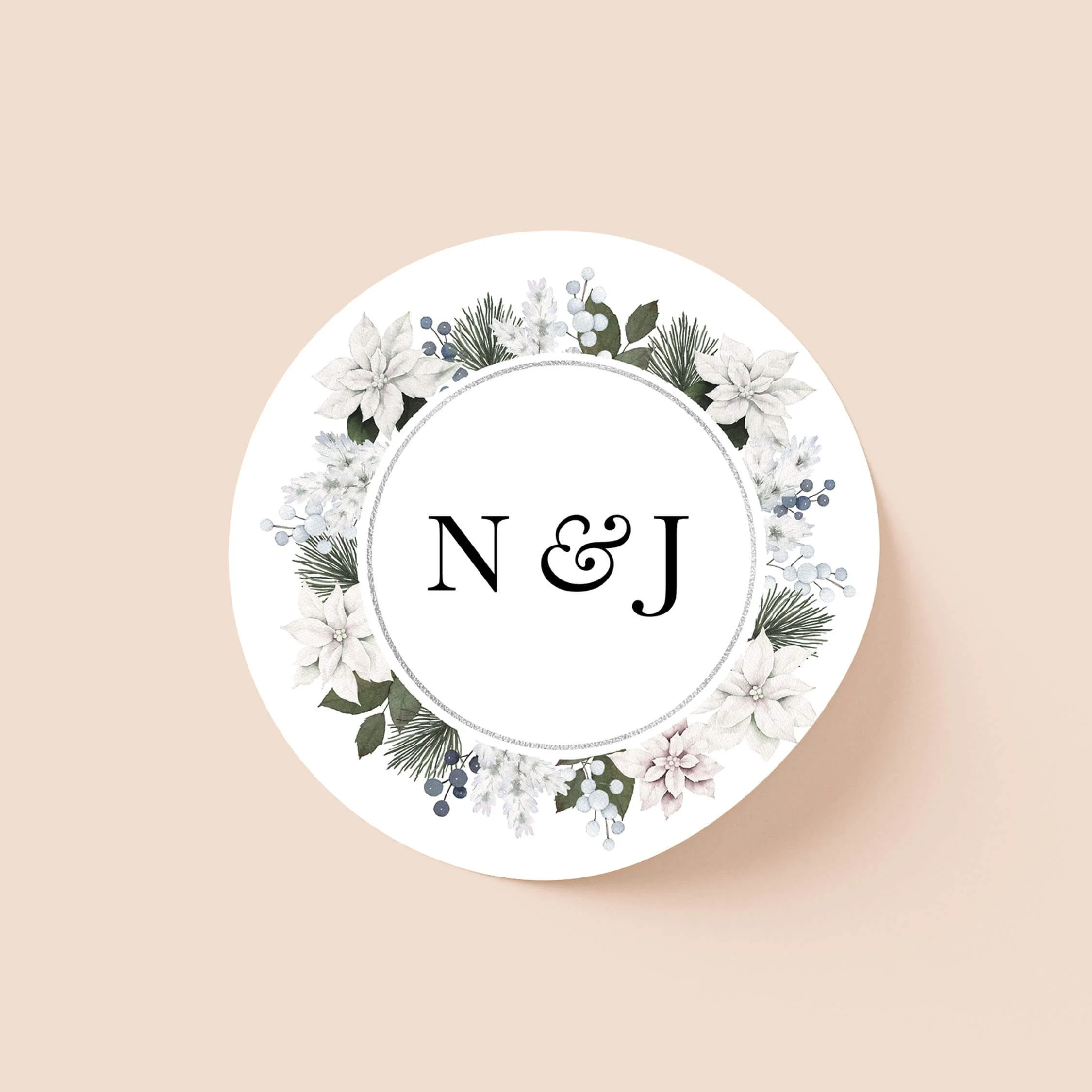Winter Frost personalised wedding sticker with white poinsettia frosted berry wreath and serif initials on round sticker