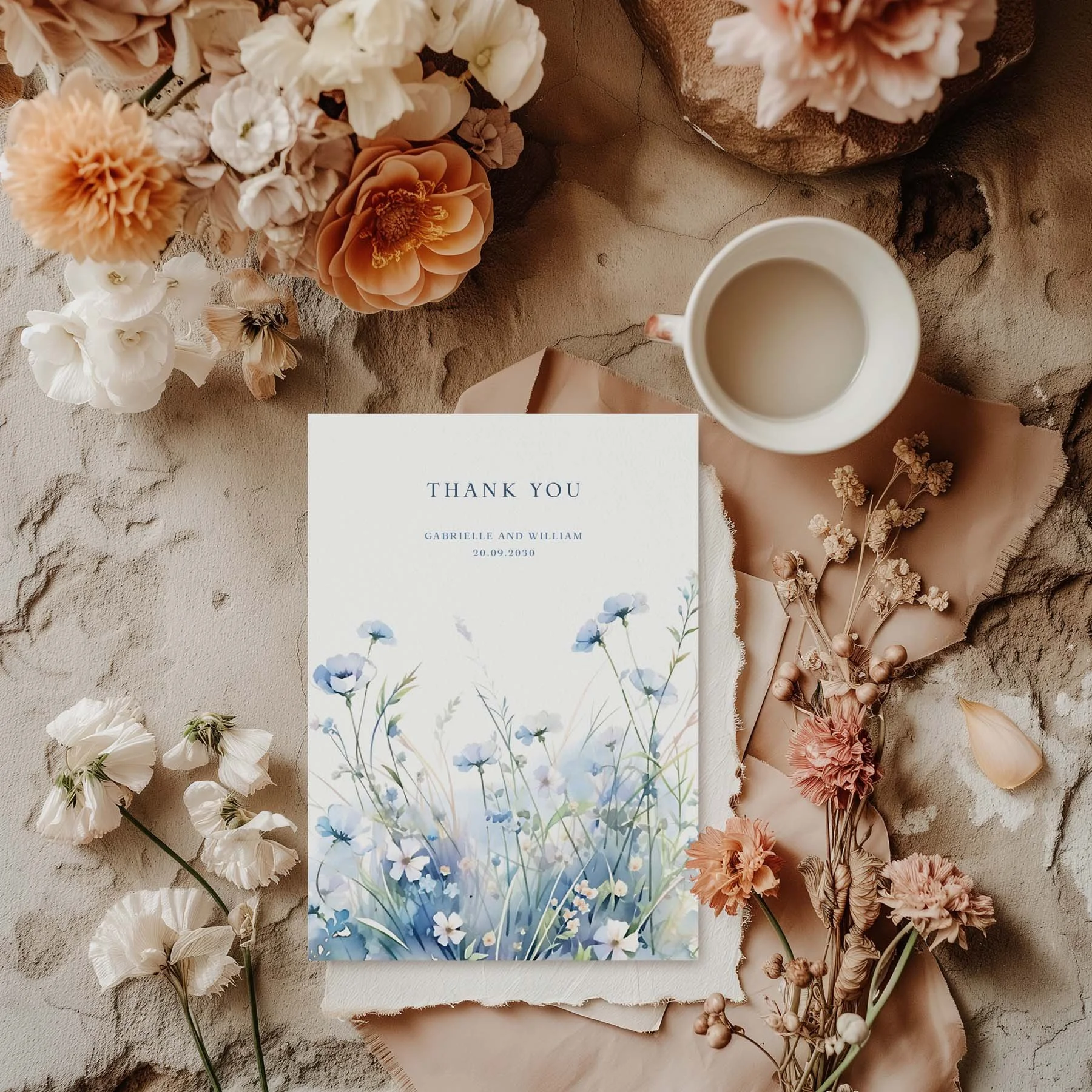 Blue Wildflowers wedding thank you card styled with flowers and stationery details