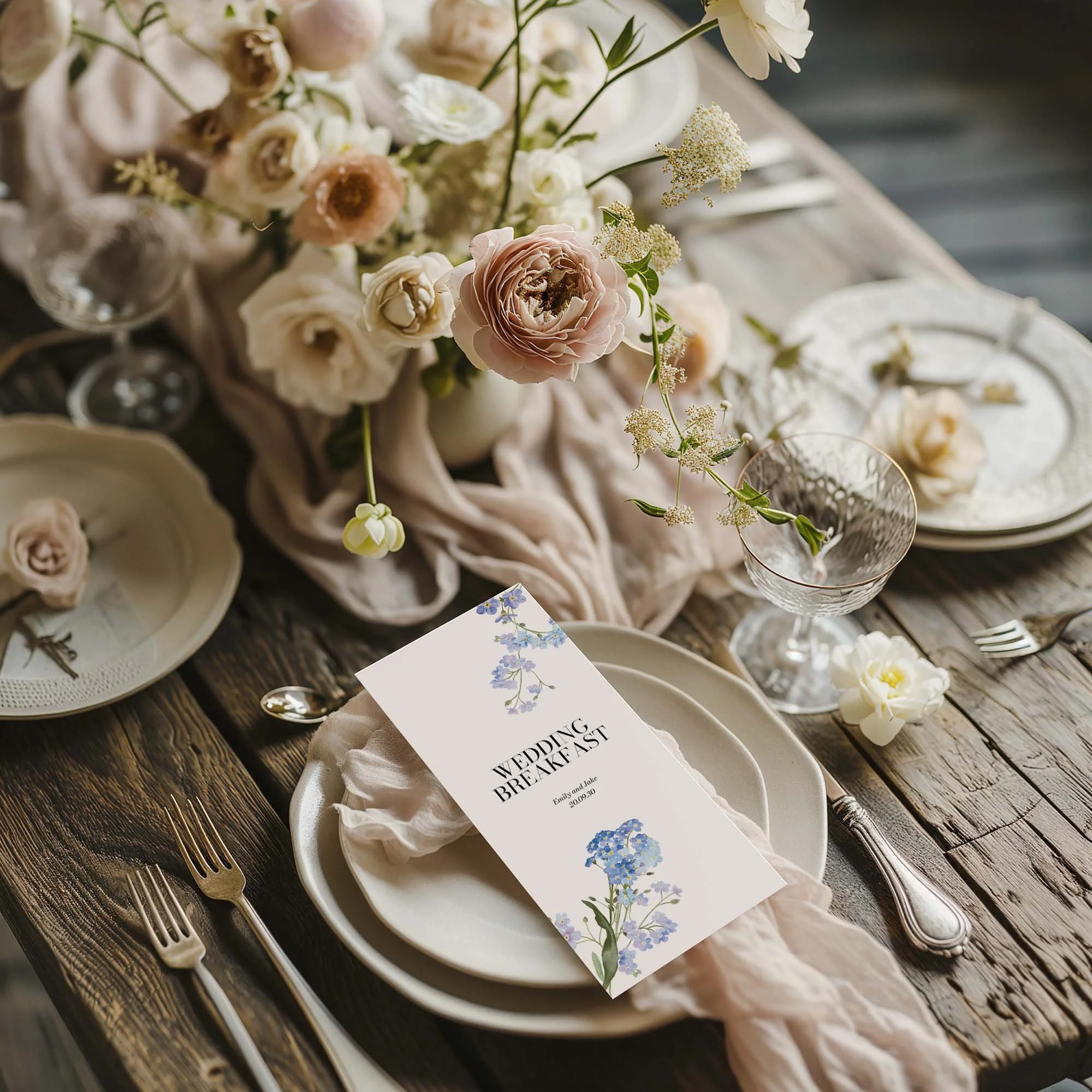Forget Me Not wedding menu card styled on a wedding table setting with tableware and décor