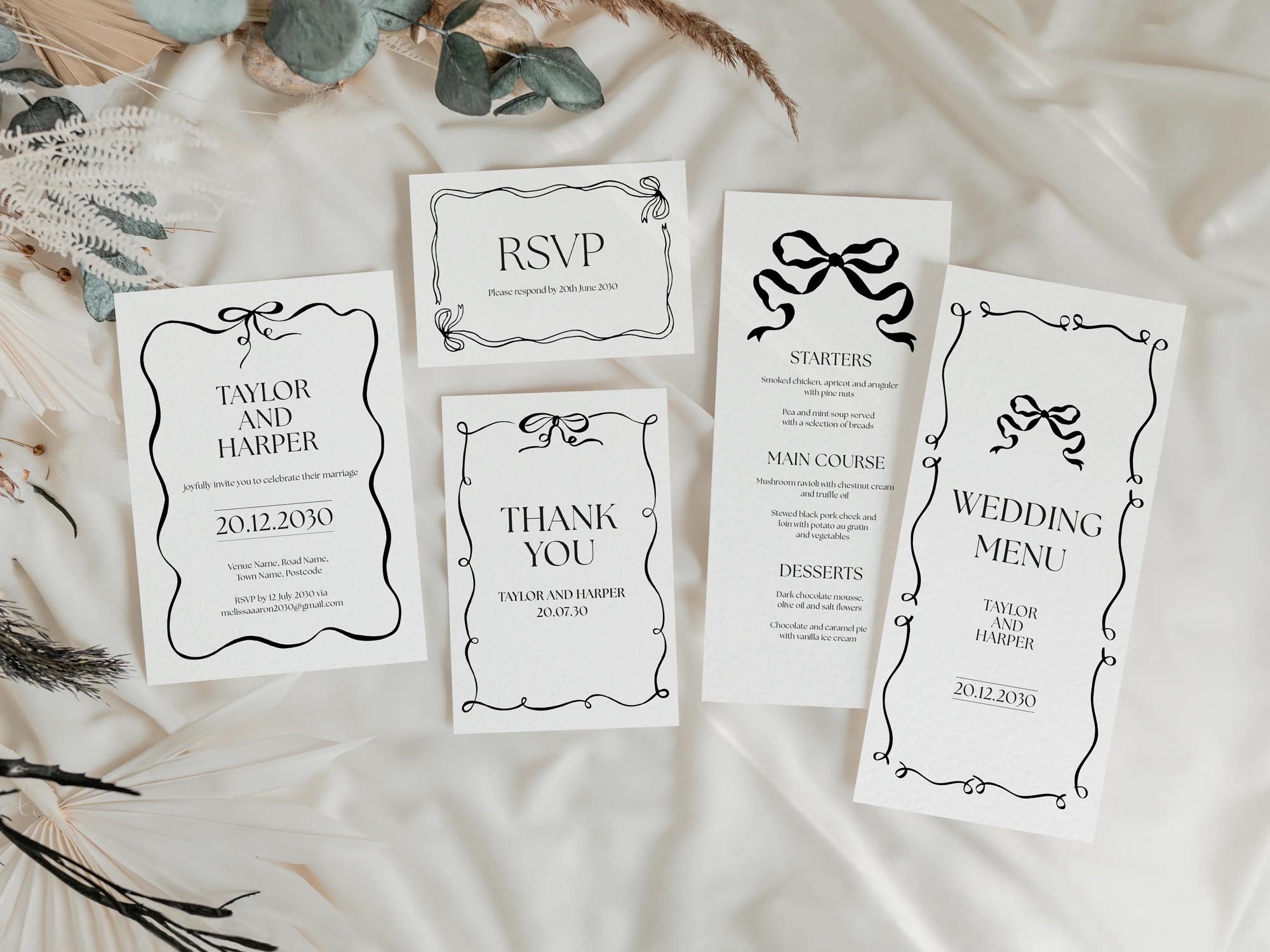 Modern wedding invitations set featuring black wavy border design
