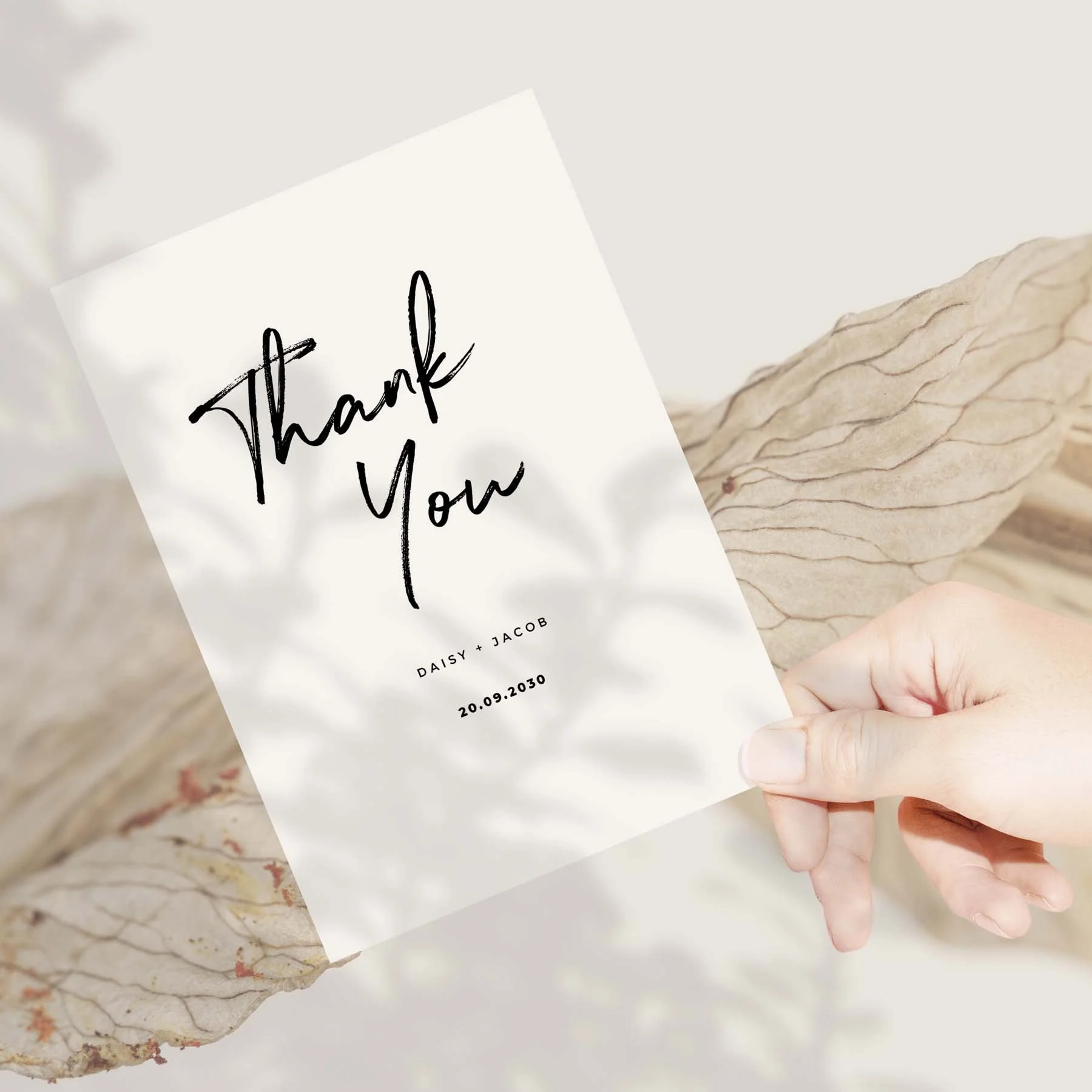 Hand holding a Modern Simple wedding thank you card