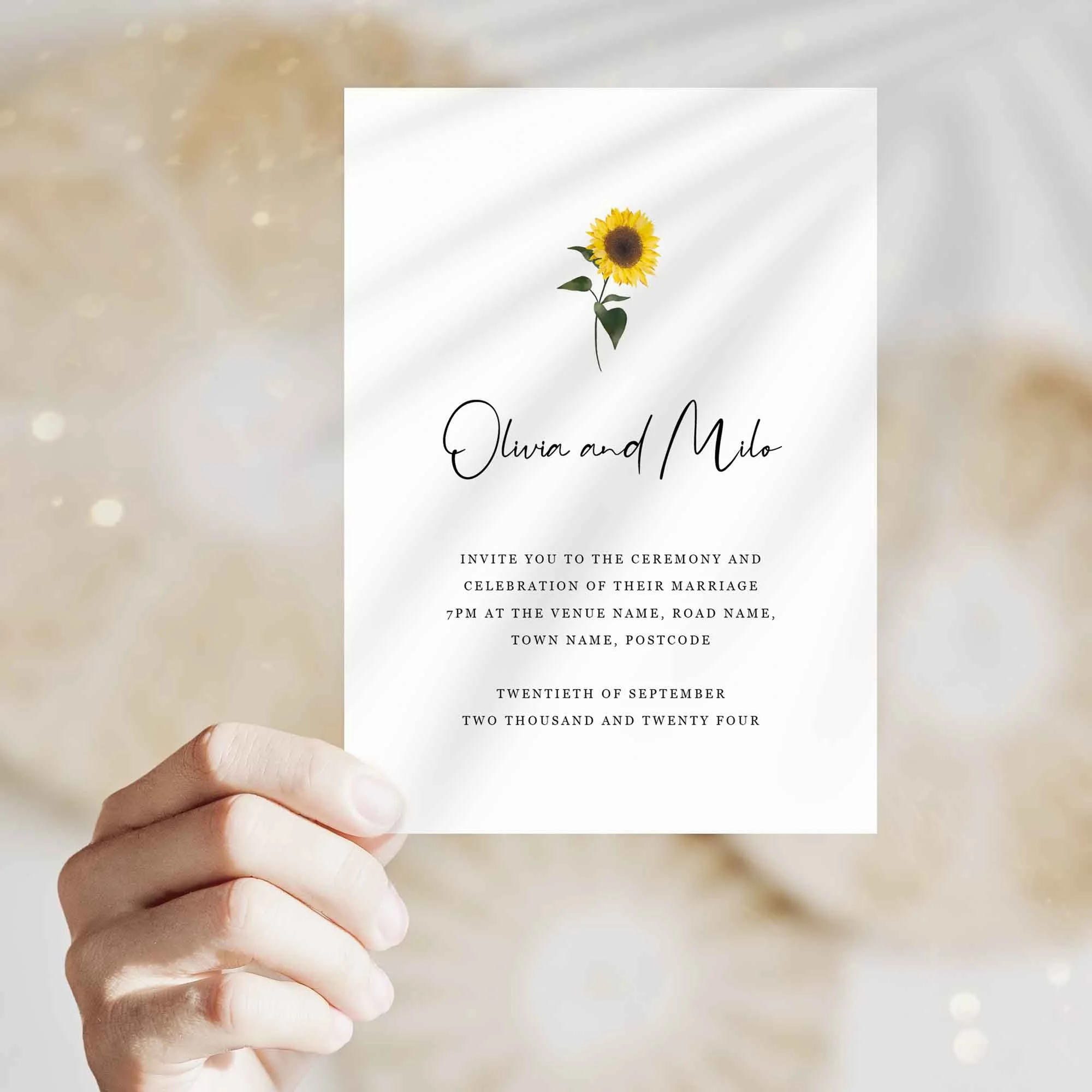Hand holding Simple Sunflower wedding invitation showing size and printed design details