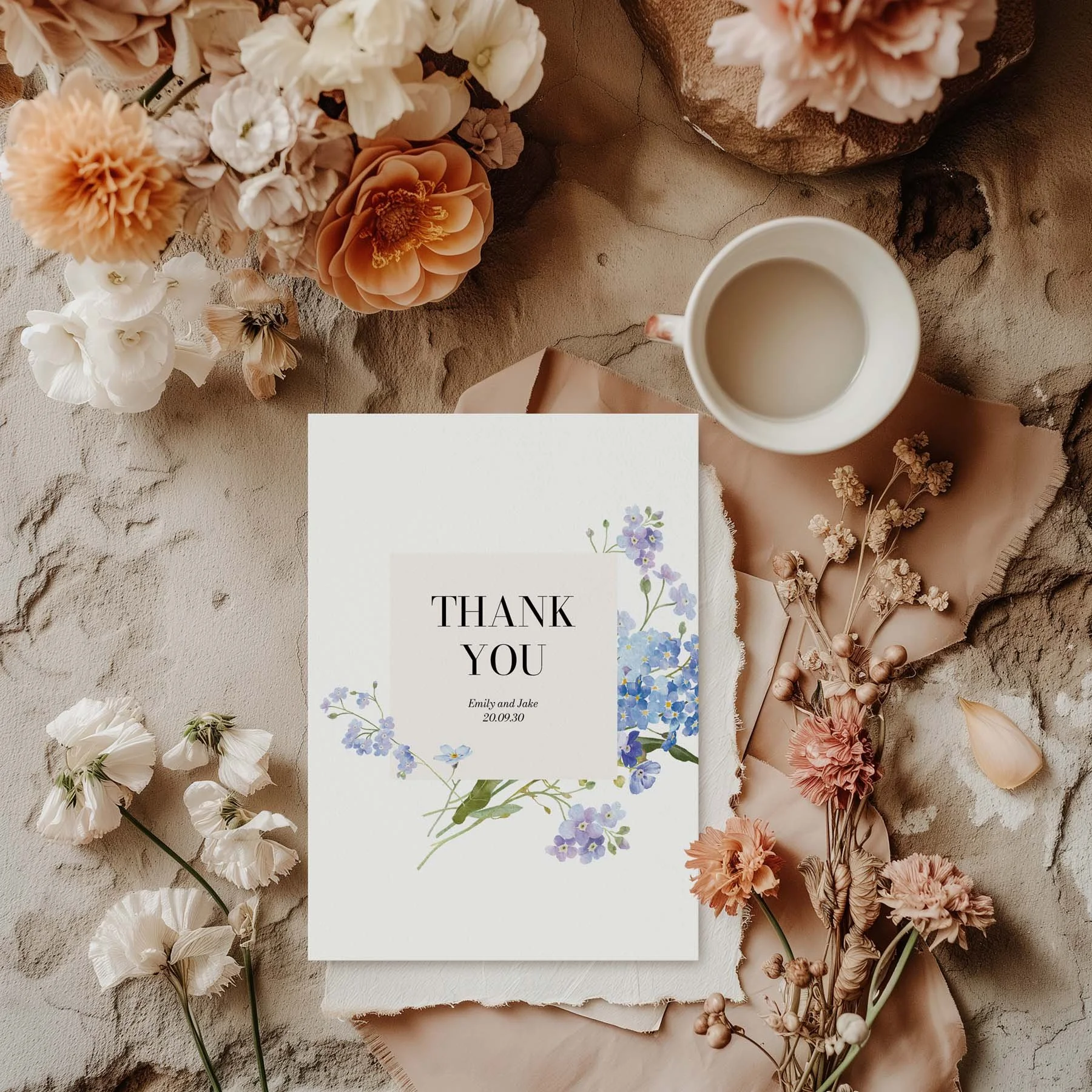 Forget Me Not wedding thank you card styled with flowers and stationery details