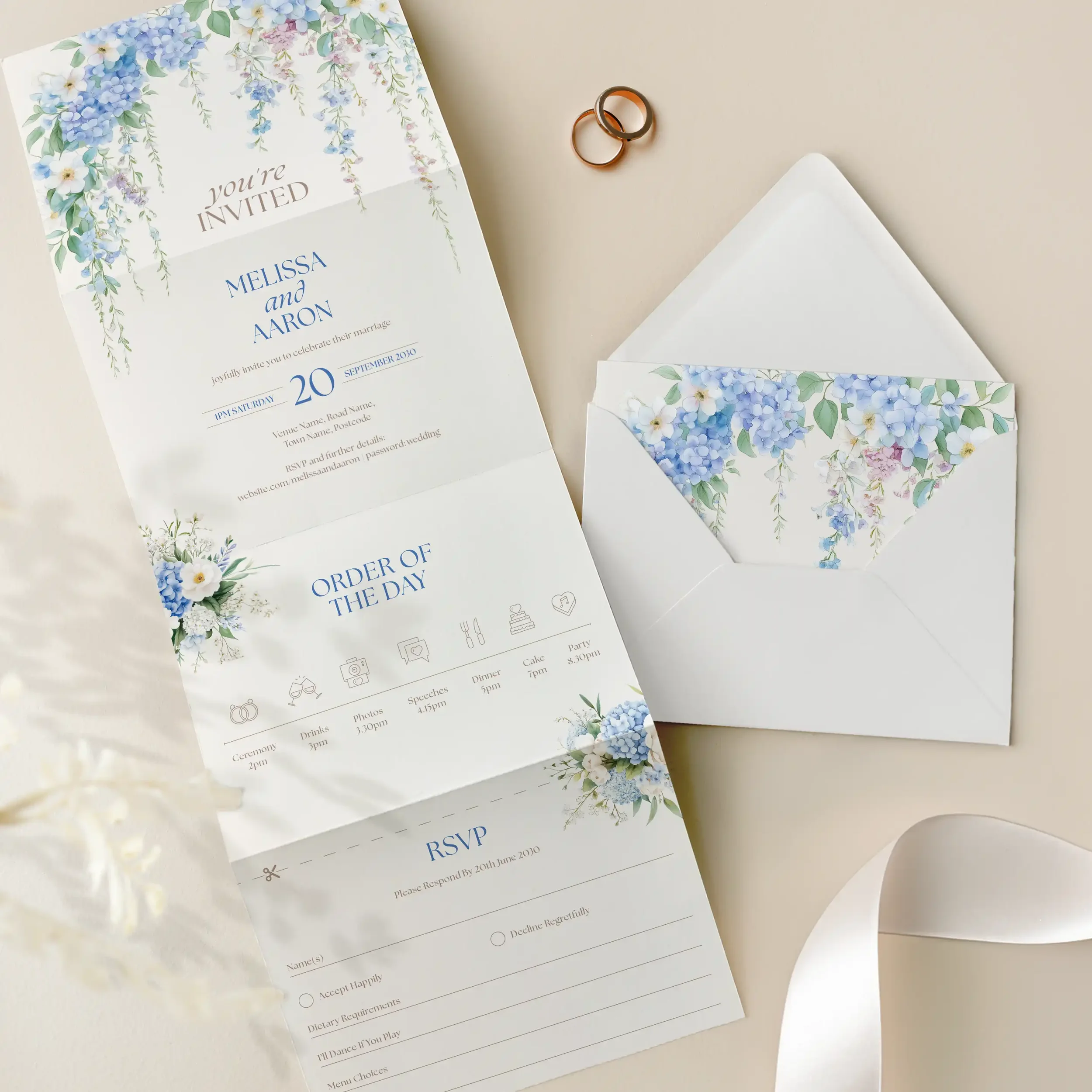 Open view of the Serenity Concertina Wedding Invitation showing cascading blue floral design.