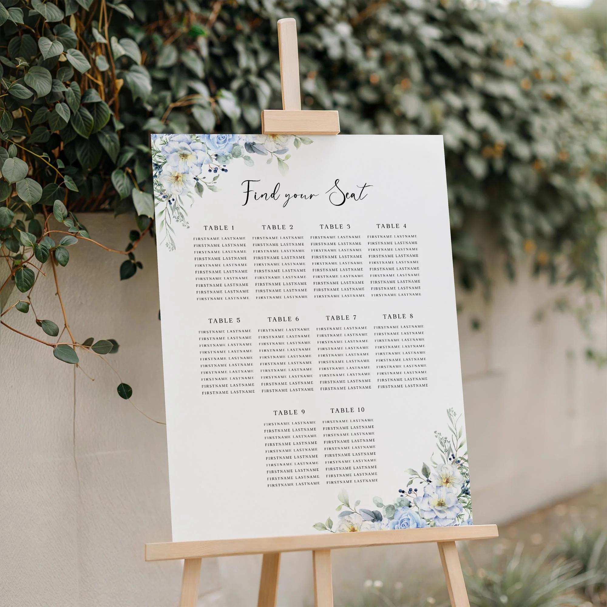 Close-up of the Blue Floral wedding seating plan board displayed outdoors