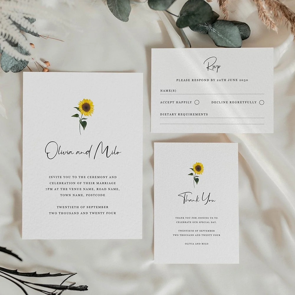 Sunflower Collection wedding stationery set including flat wedding invitation, RSVP card, and thank you card with minimal sunflower illustration.