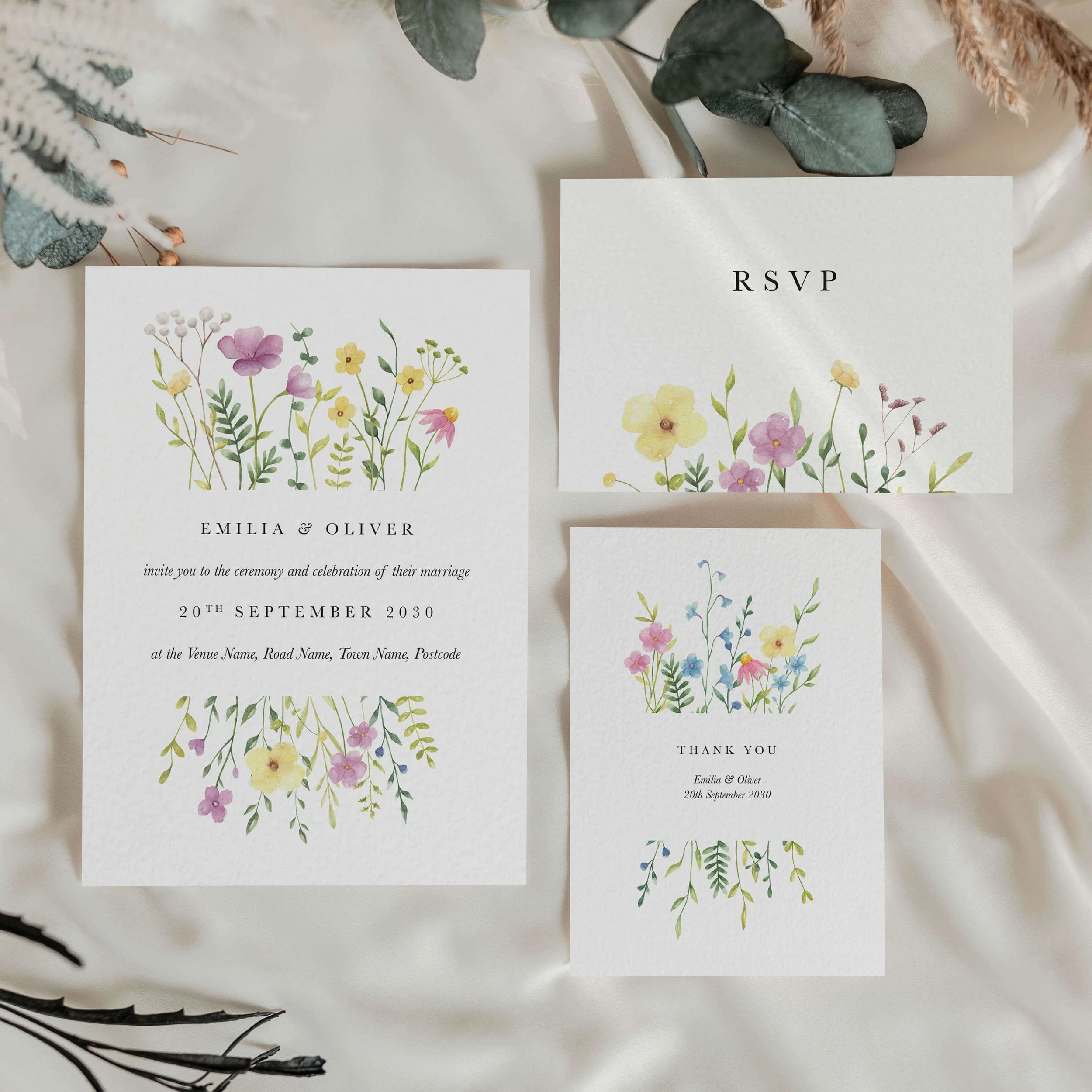 Wildflower wedding invitation set in bright, colourful wildflower design