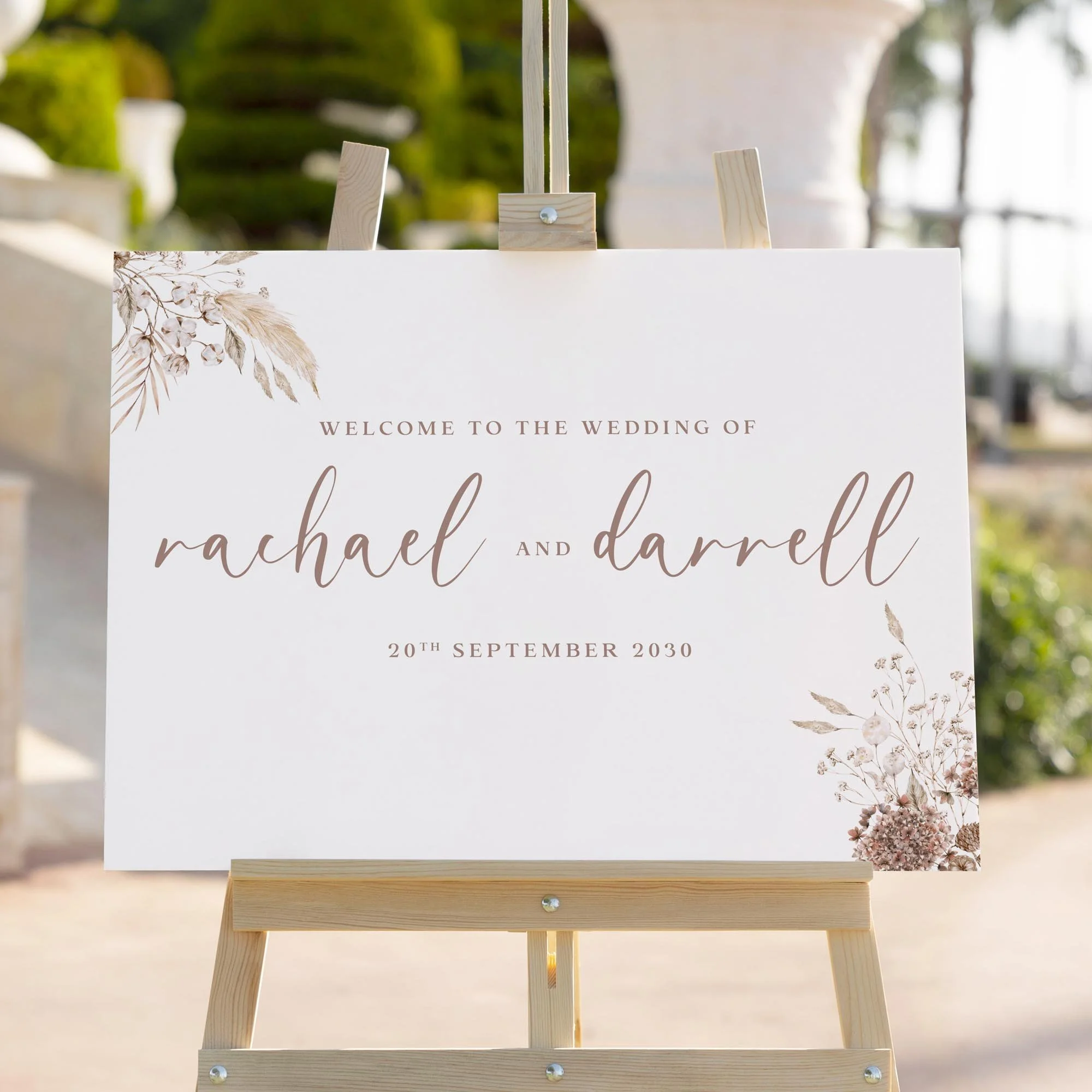 Boho Calligraphy wedding welcome sign styled outdoors close-up