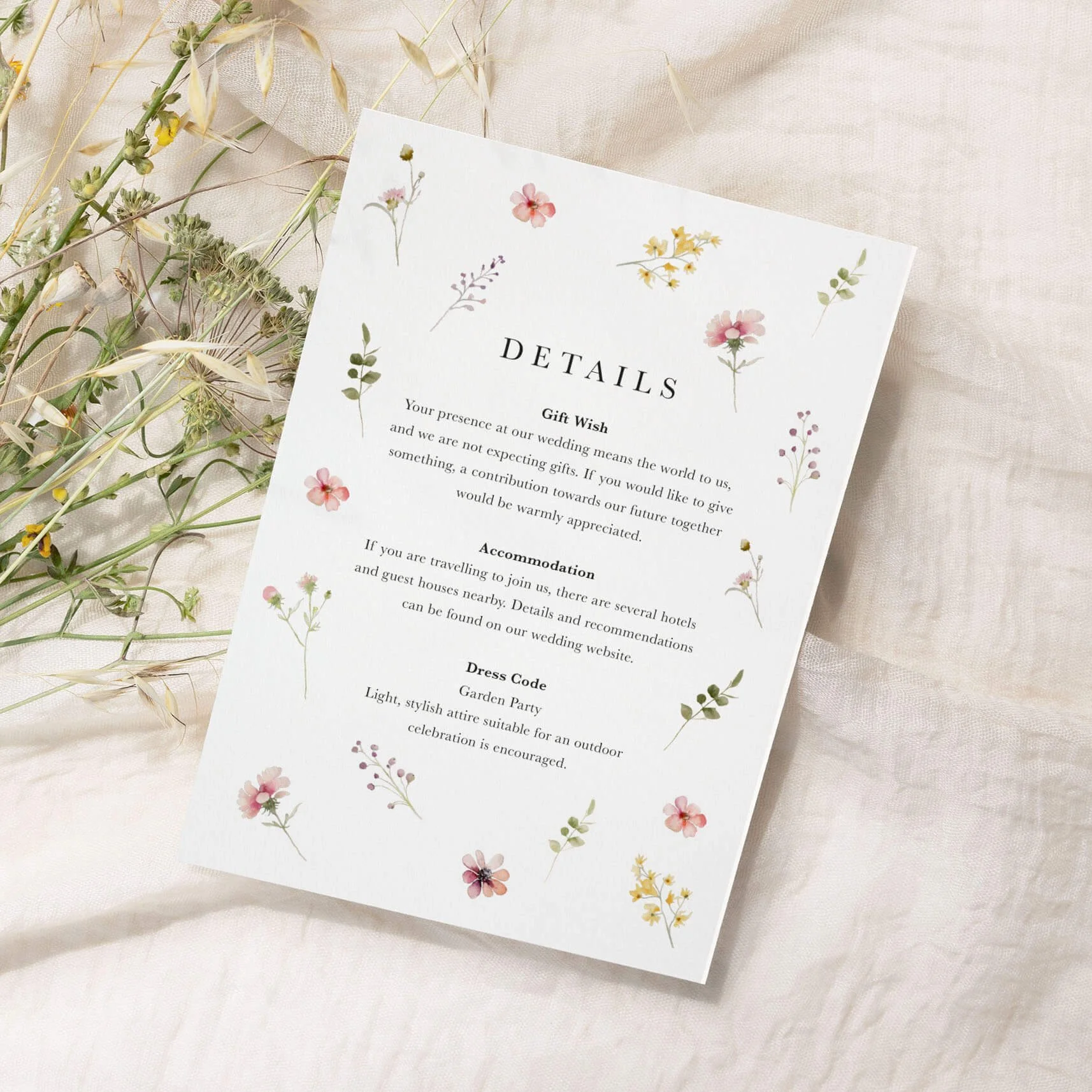 Flora.jpgWedding information cards in A6 and A7 sizes showing accommodation details and menu options alongside invitations.