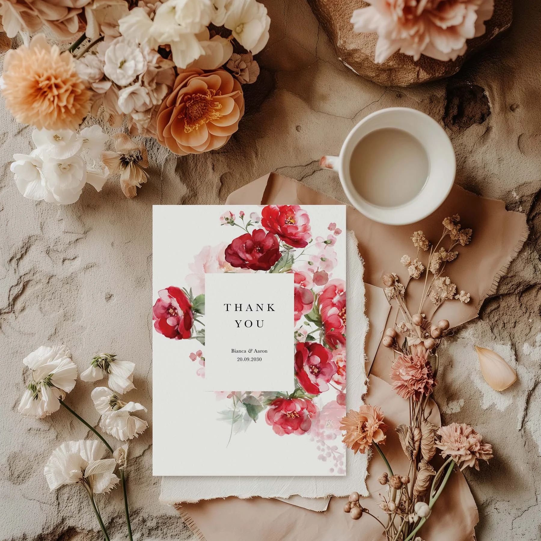 Red Floral wedding thank you card styled with flowers and stationery details