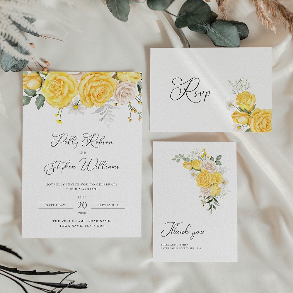 Wedding stationery suite including invitation, RSVP, invitation, and thank you card with bright yellow florals in the corner and elegant serif typography.
