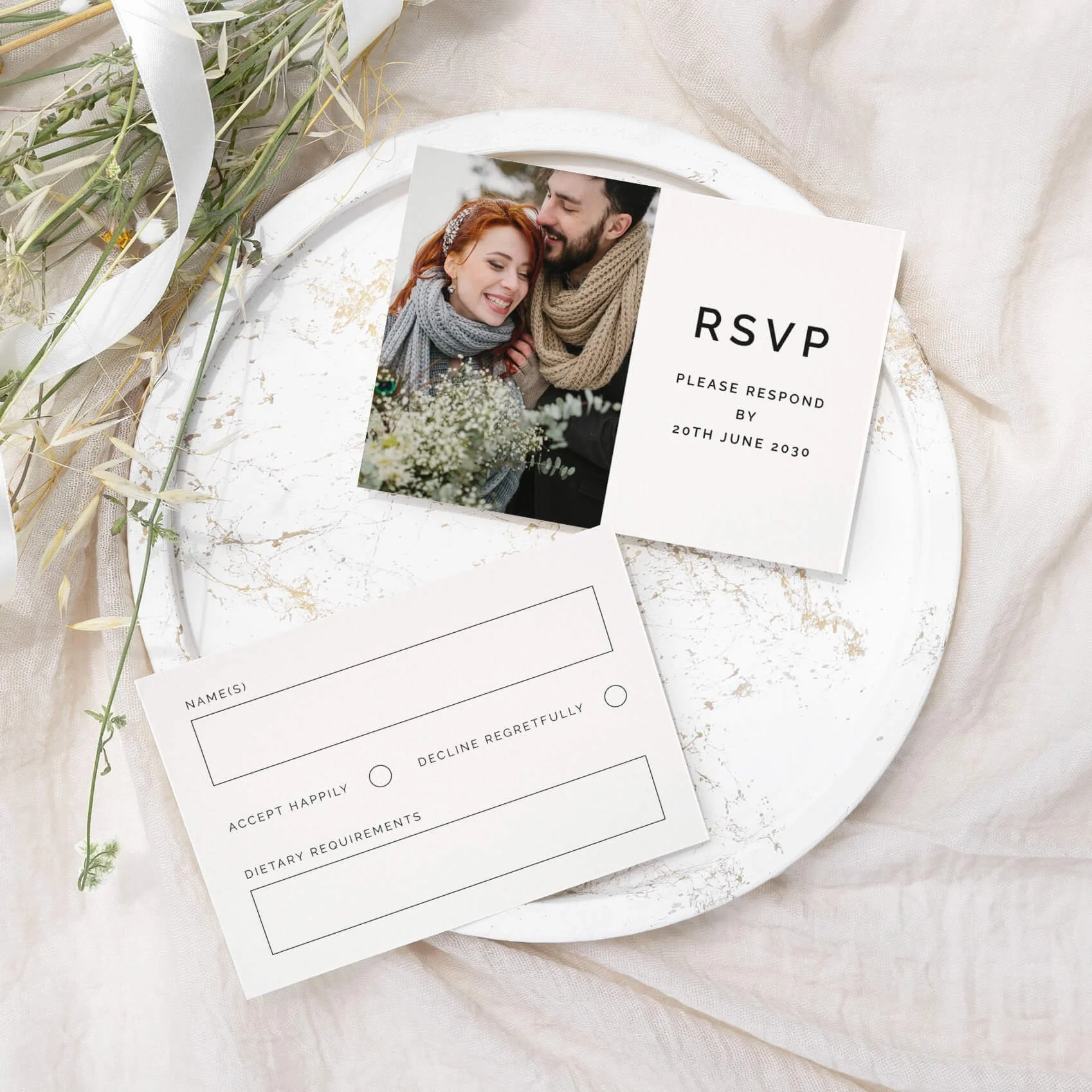 Photograph wedding RSVP card with couple's engagement photo and elegant serif typography on luxury off-white card