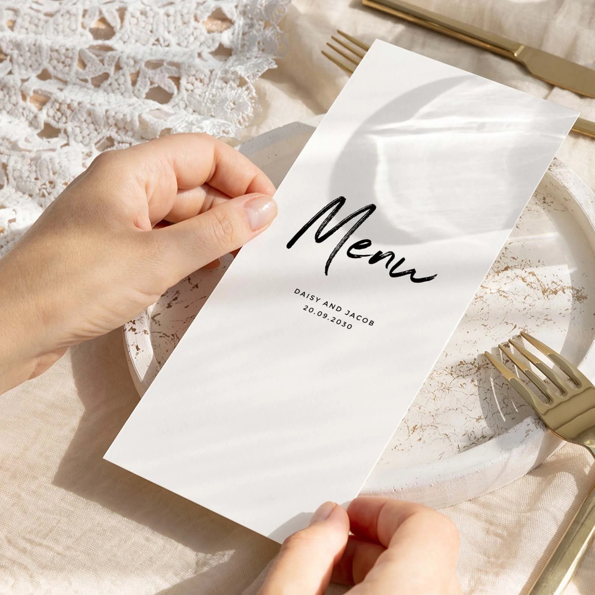 Hand holding Signature wedding menu card showing size and printed design details