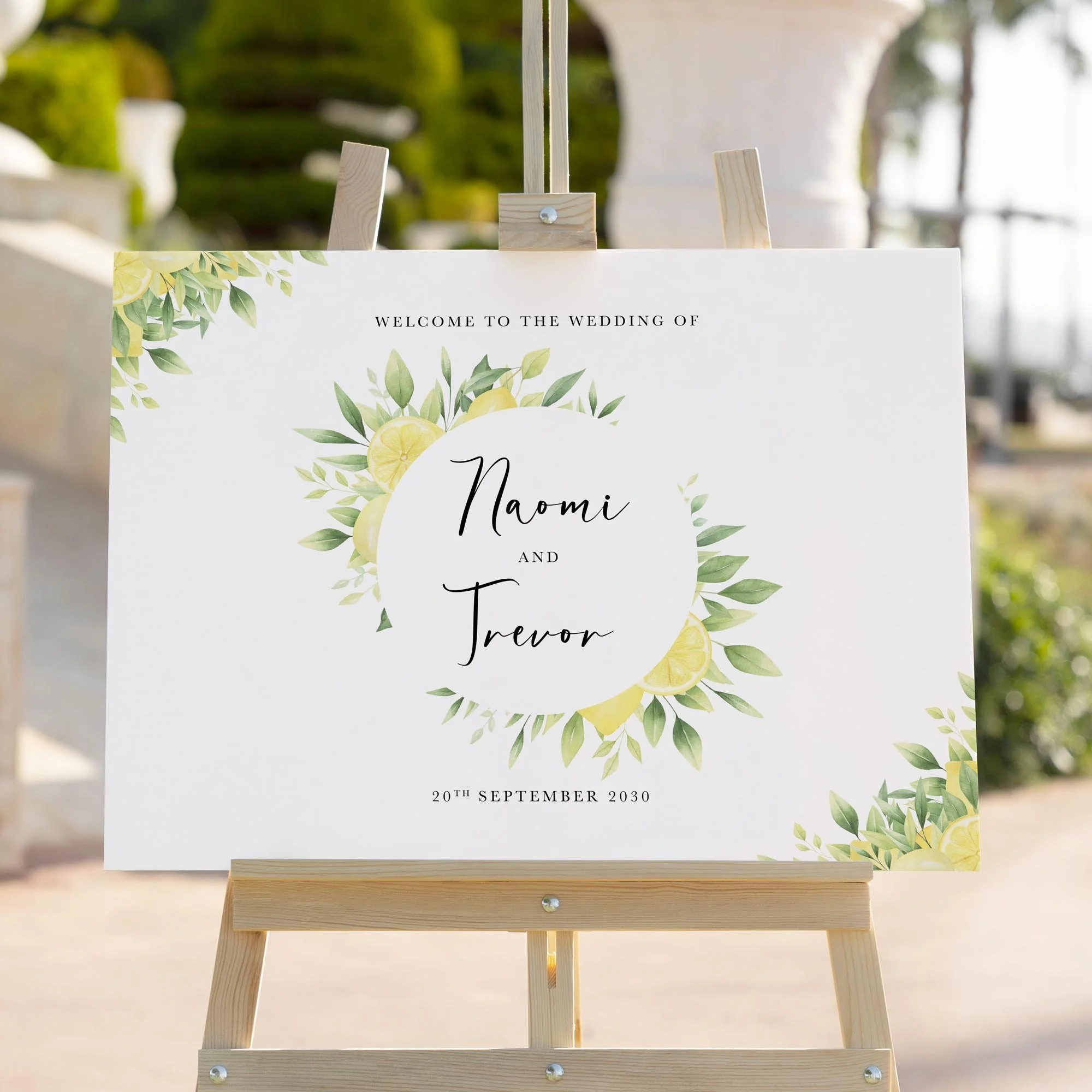 Lemon wedding welcome sign styled outdoors close-up