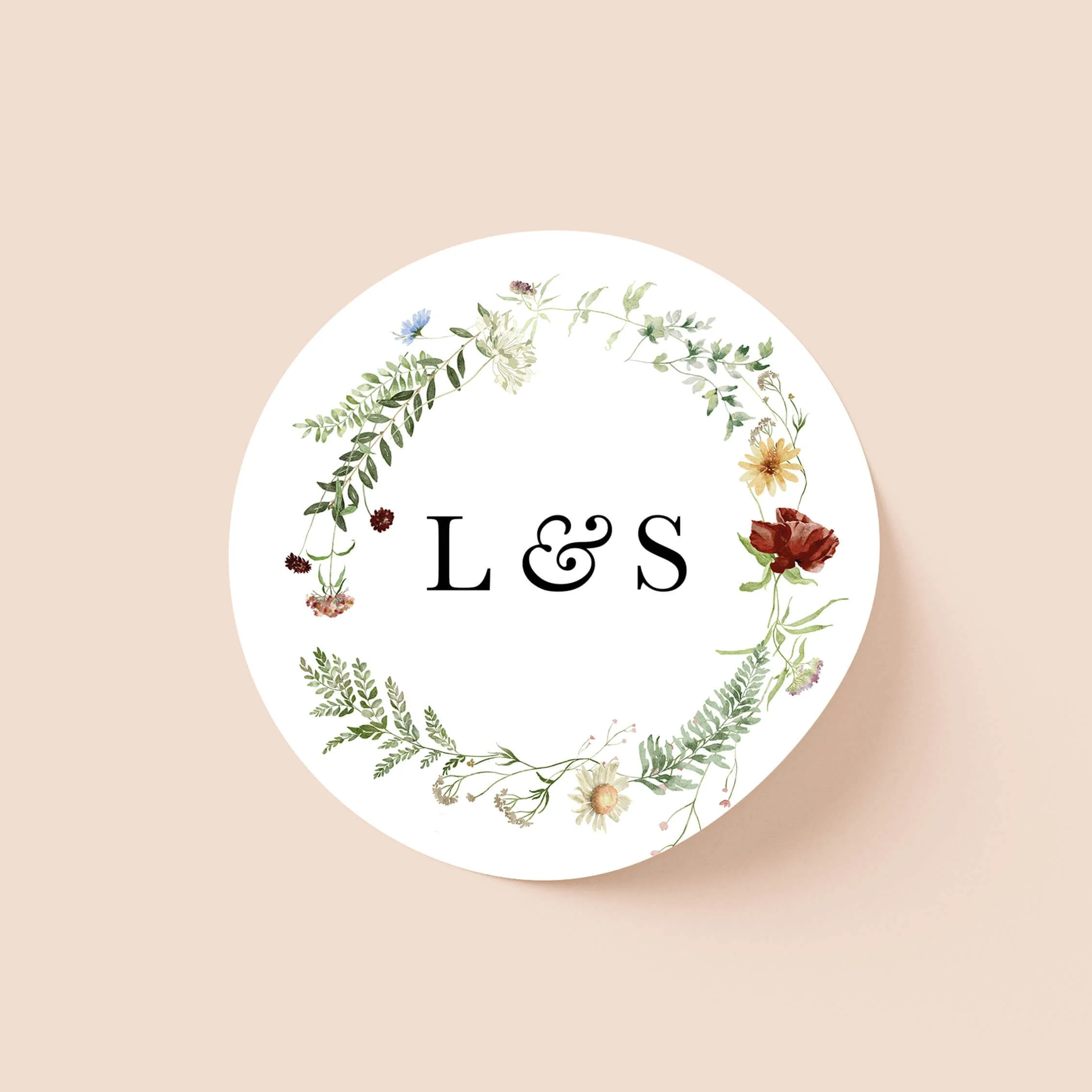 Meadow personalised wedding sticker with wildflower meadow wreath and personalised initials on round sticker