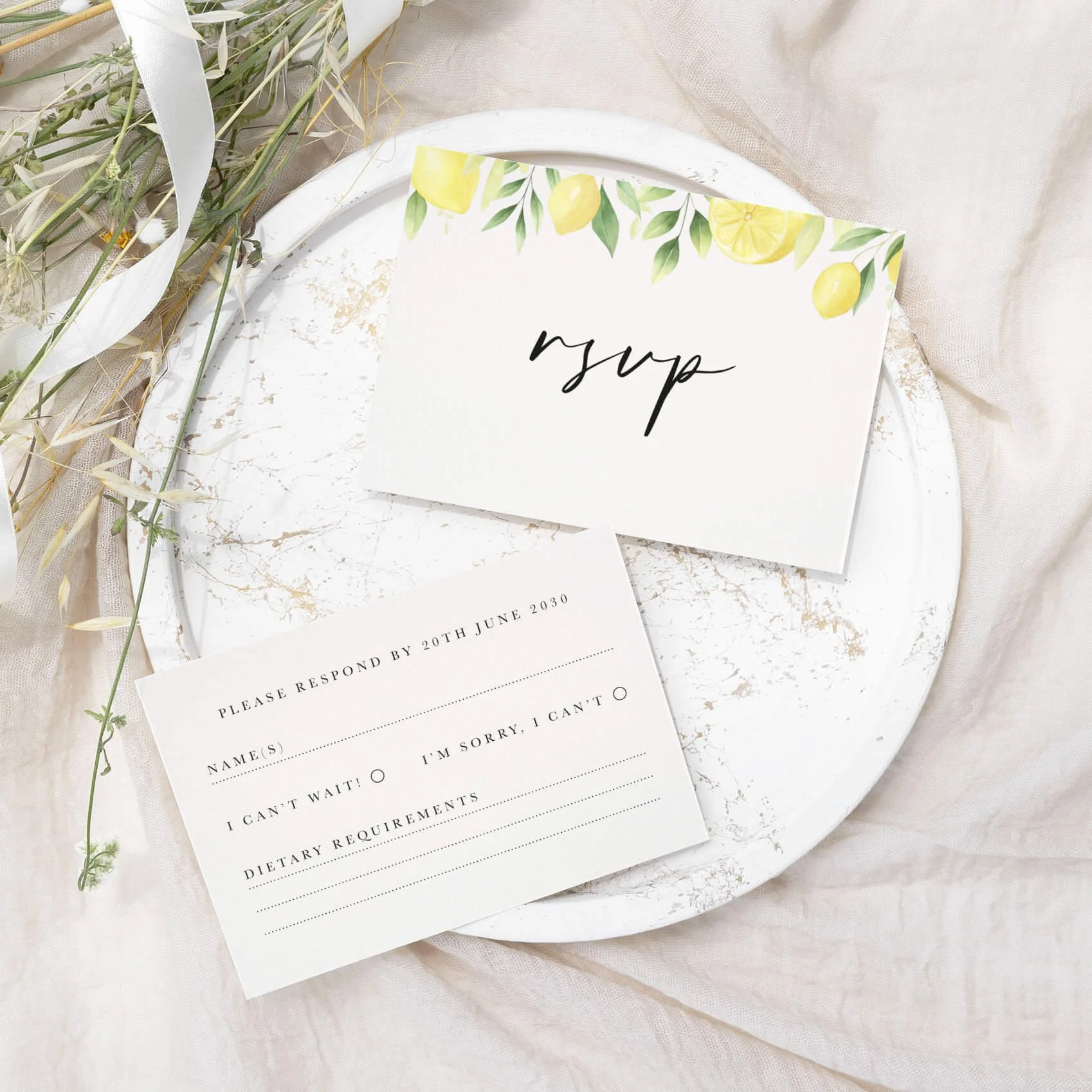 Lemon wedding RSVP card with yellow and green watercolour citrus botanical illustration on luxury off-white card