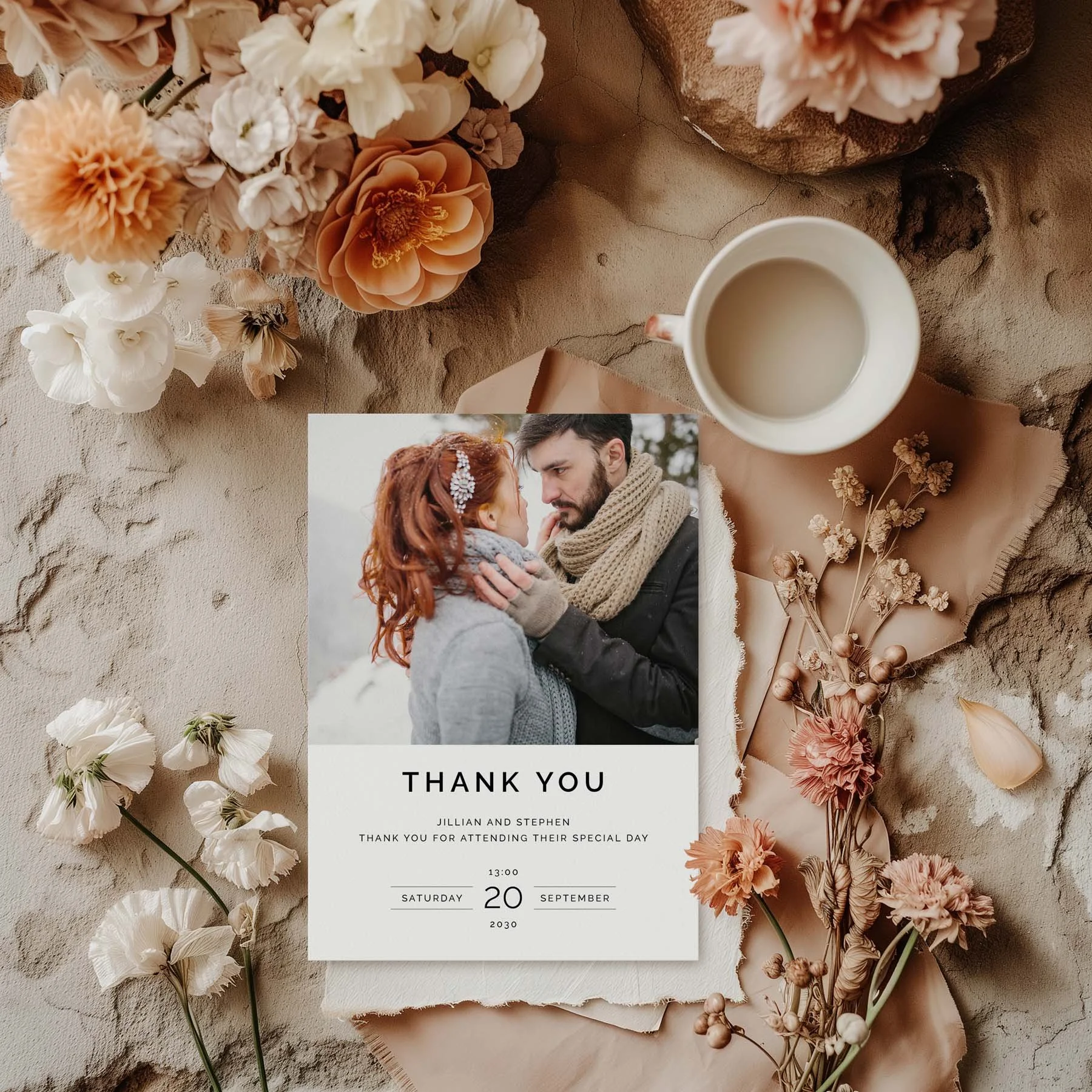 Photo wedding thank you card styled with flowers and stationery details