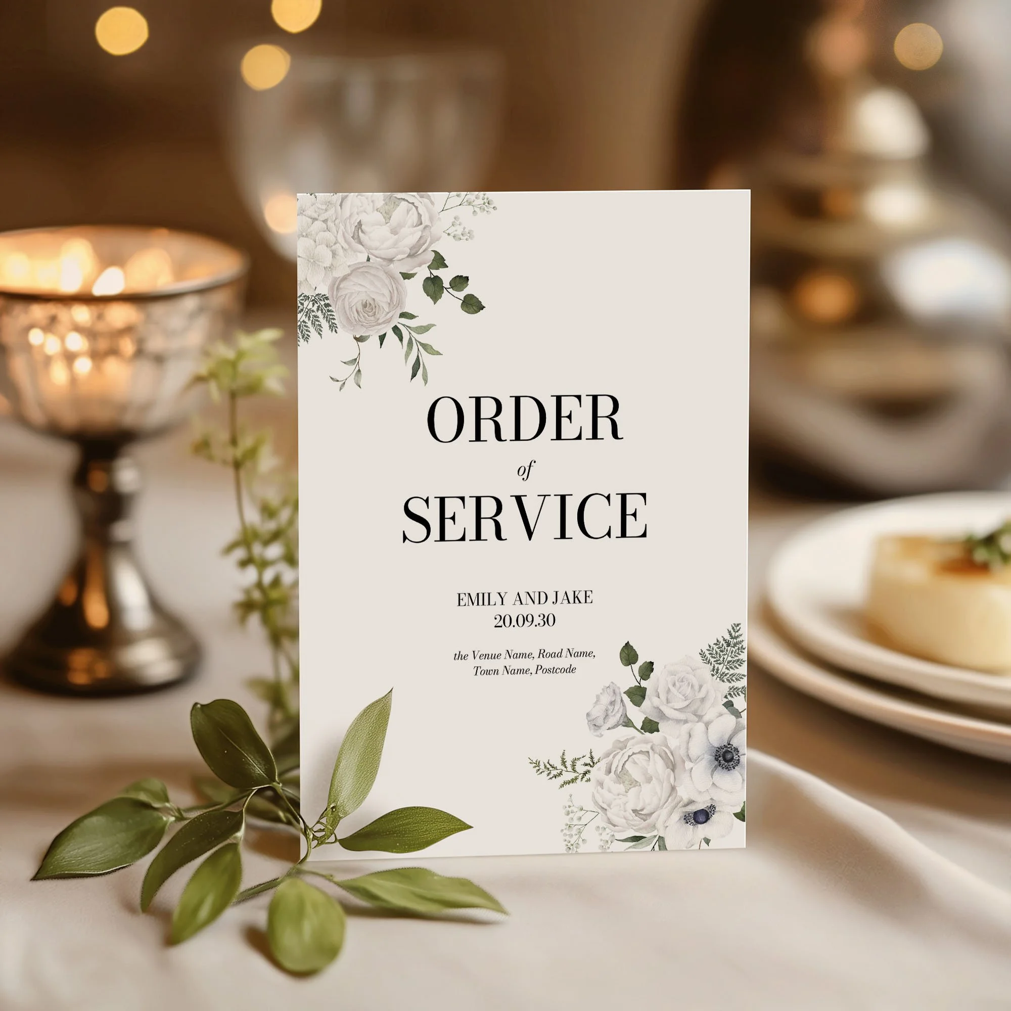 White Floral wedding order of service on a wedding day displayed