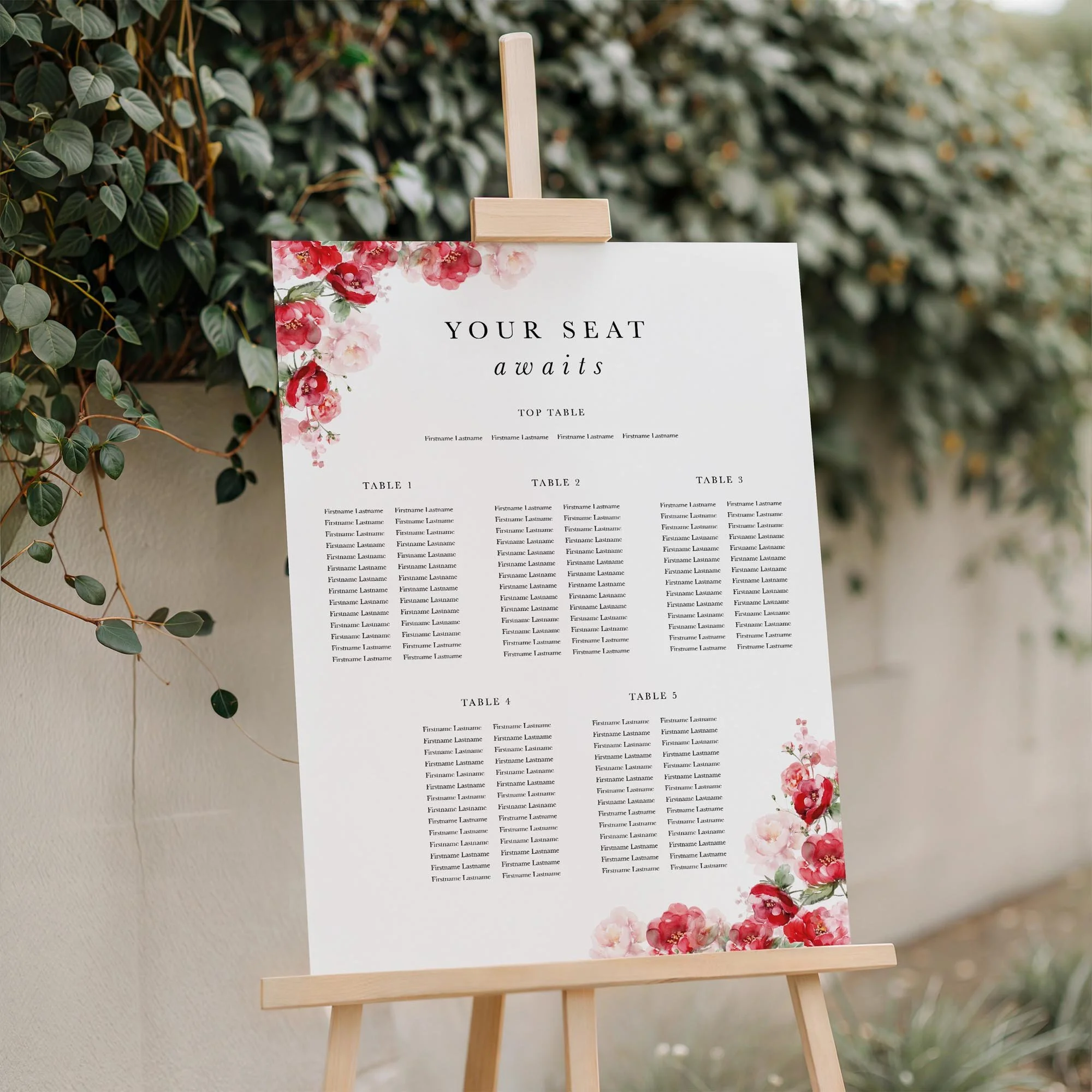 Close-up of the Red Floral wedding seating plan board displayed outdoors