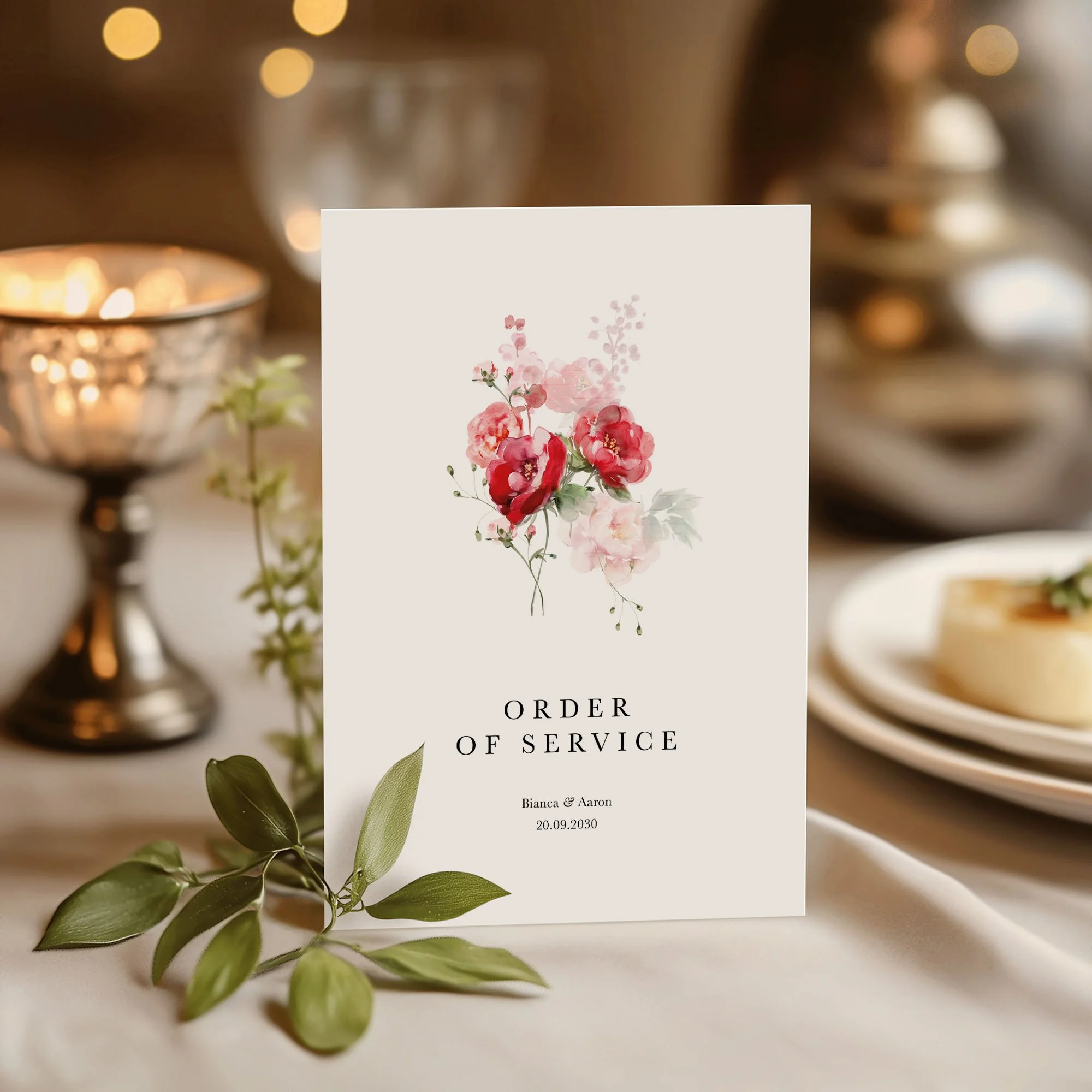 Red Floral wedding order of service on a wedding day displayed