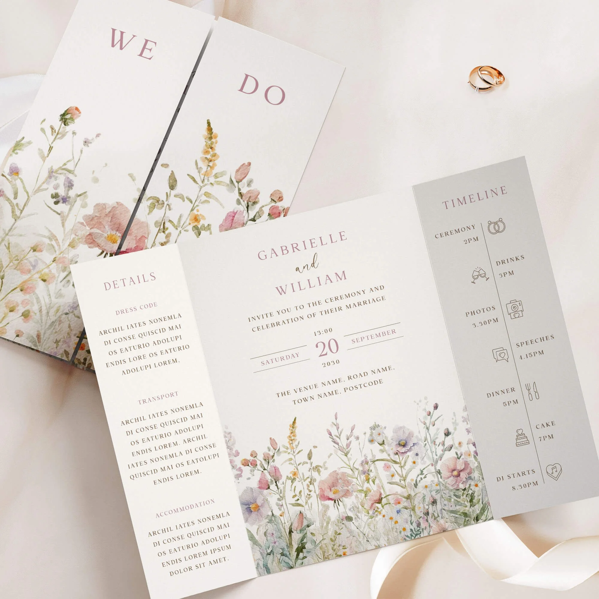 Gatefold wedding invitation with soft powder pastel wildflower meadow watercolour blooms