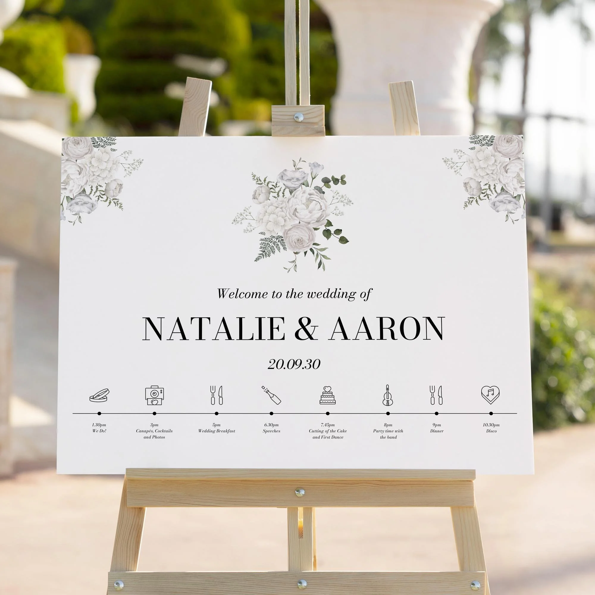 White Anemone Floral wedding welcome sign styled outdoors close-up