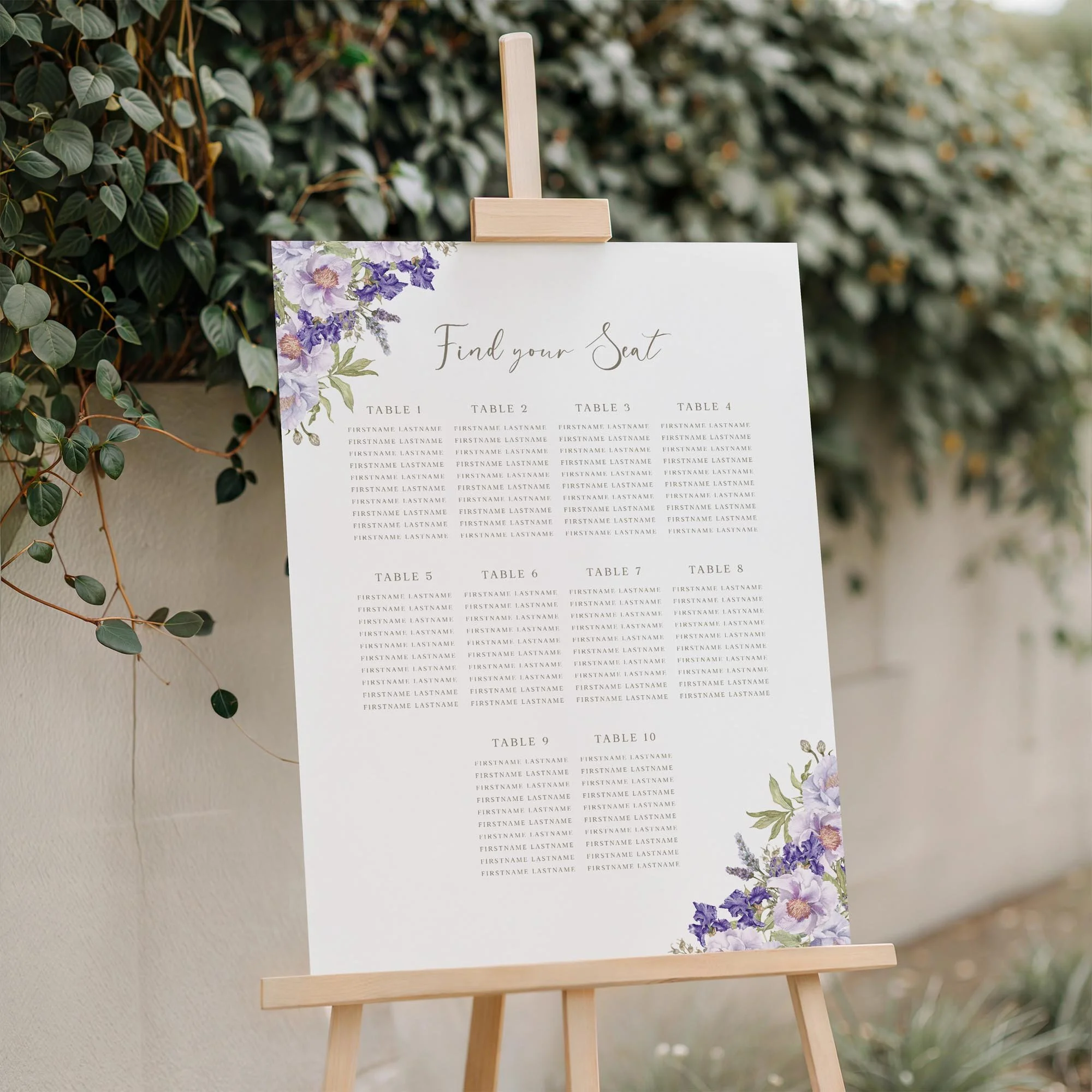 Close-up of the Purple Floral wedding seating plan board displayed outdoors