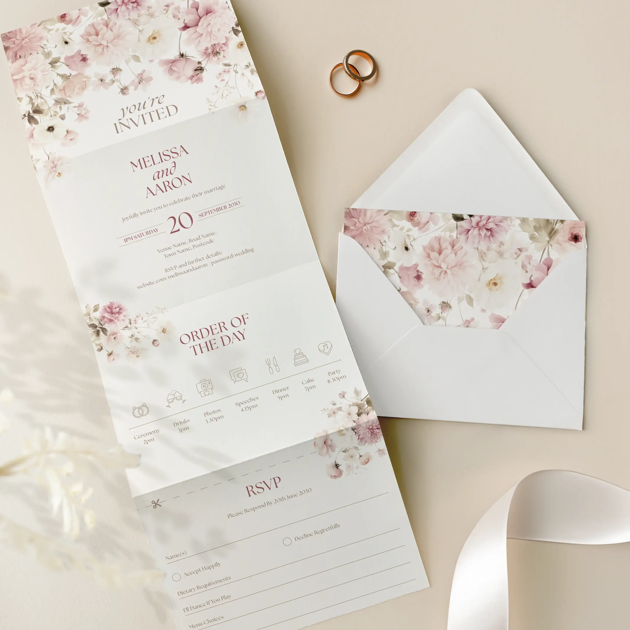 Open view of the Petal Concertina Wedding Invitation showing blush pink florals and modern typography.