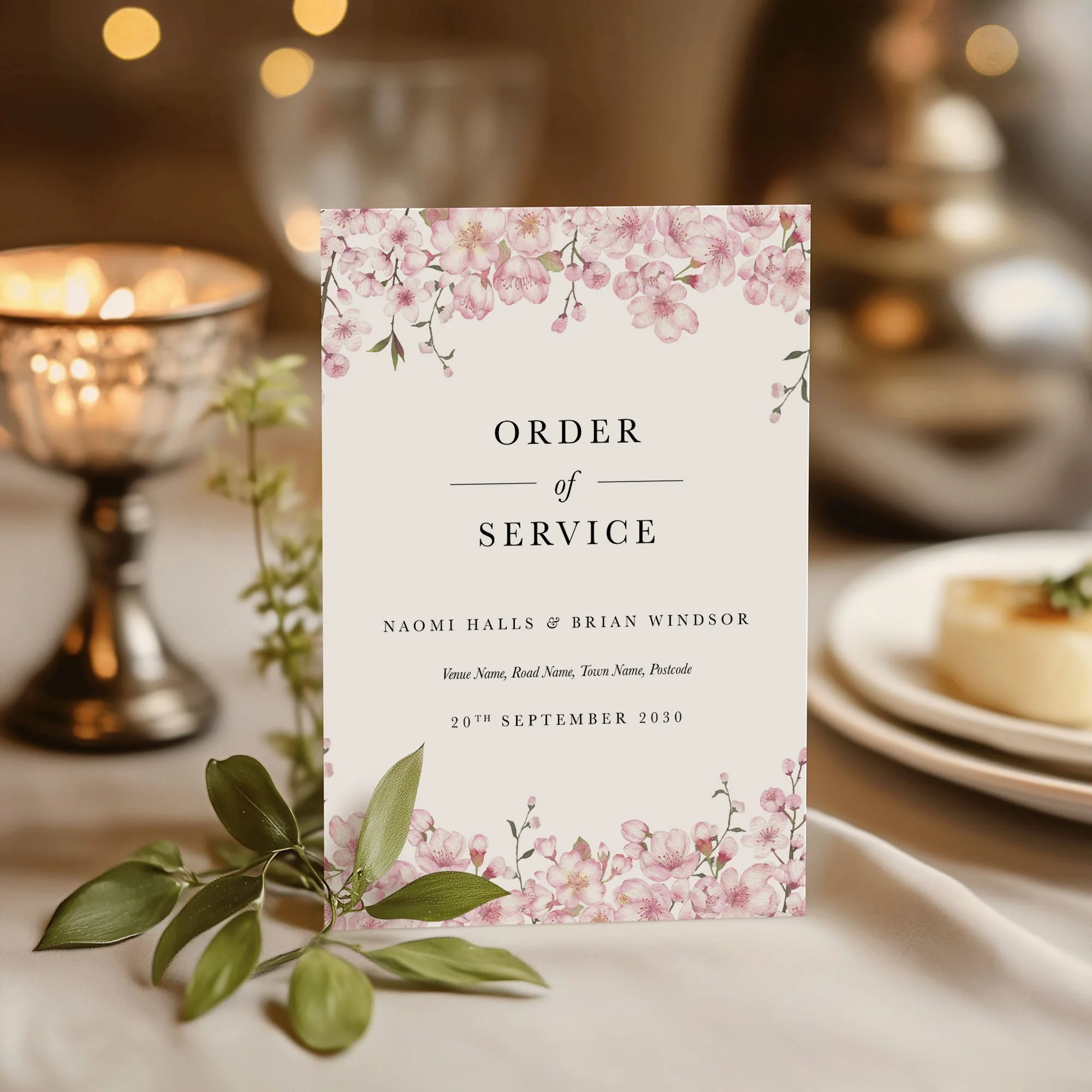 Cherry Blossom wedding order of service on a wedding day displayed