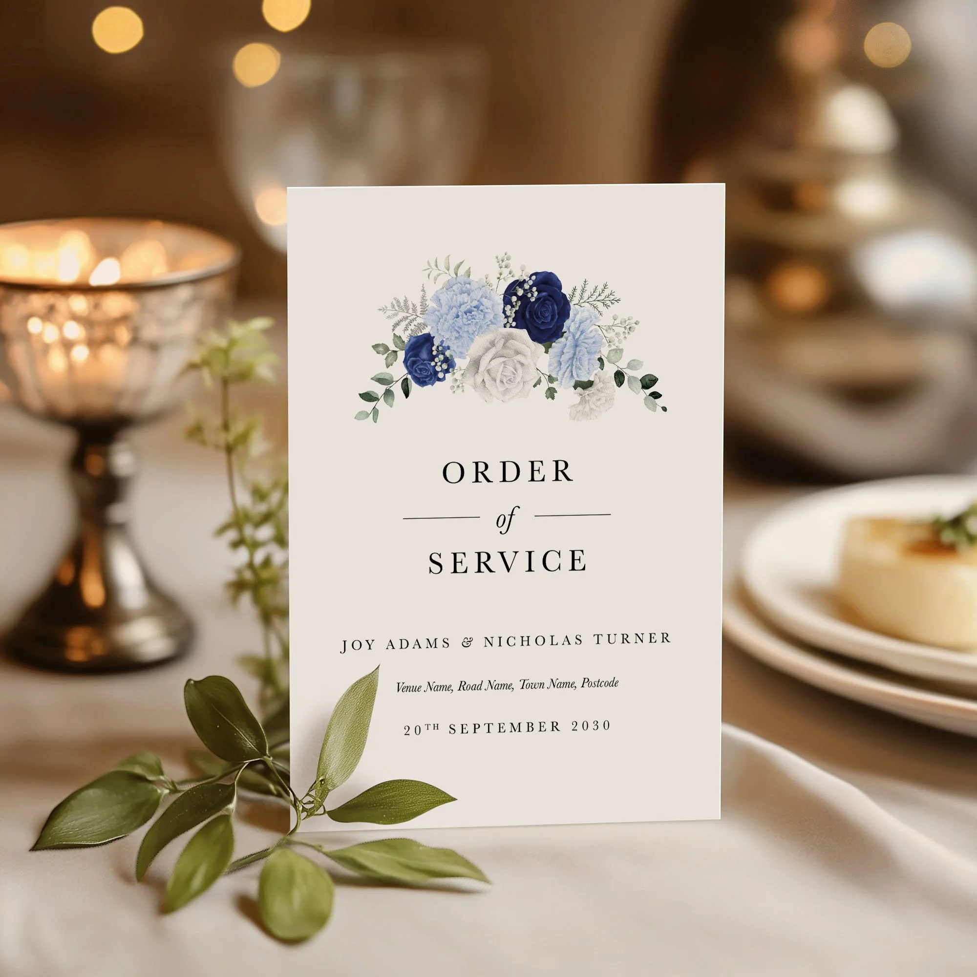 Blue and white Rose wedding order of service on a wedding day displayed