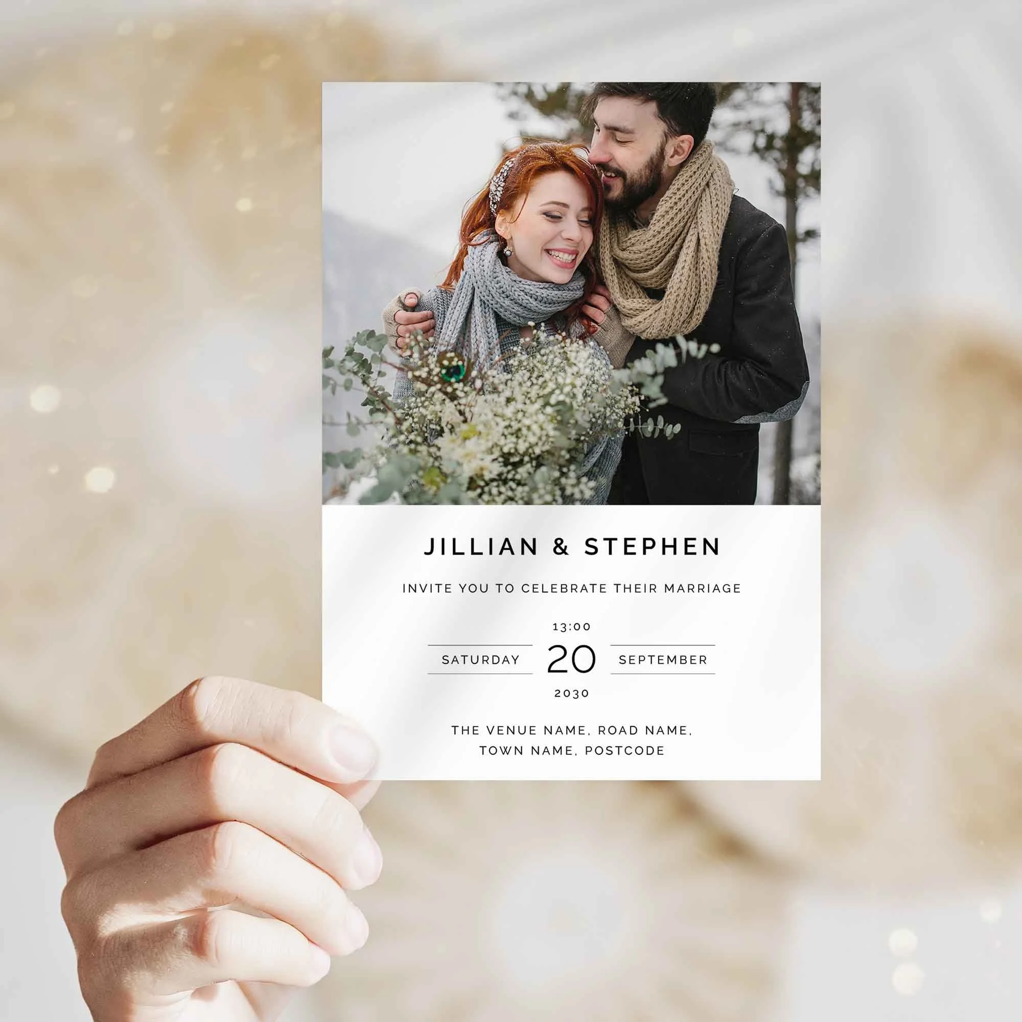 Hand holding Photograph wedding invitation showing size and printed design details