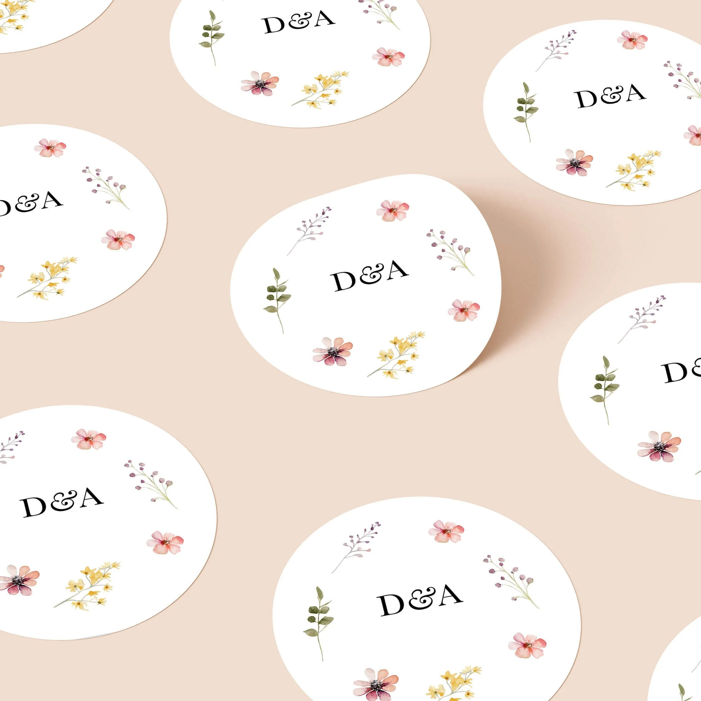 Flora Bloom personalised wedding sticker with delicate scattered floral botanical design and elegant initials on round sticker