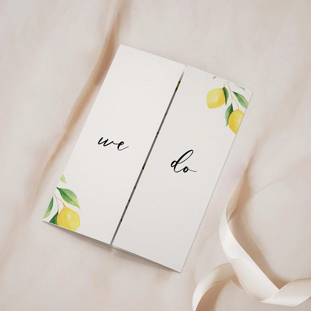 Lemon Collection gatefold wedding invitation closed, featuring hand-painted Sicilian lemons across the top and flowing calligraphy font.