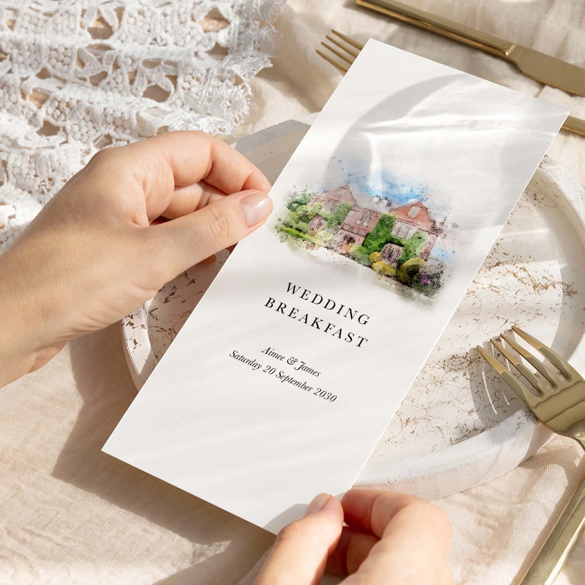 Wedding breakfast menu featuring personalised watercolour venue illustration and elegant serif typography.