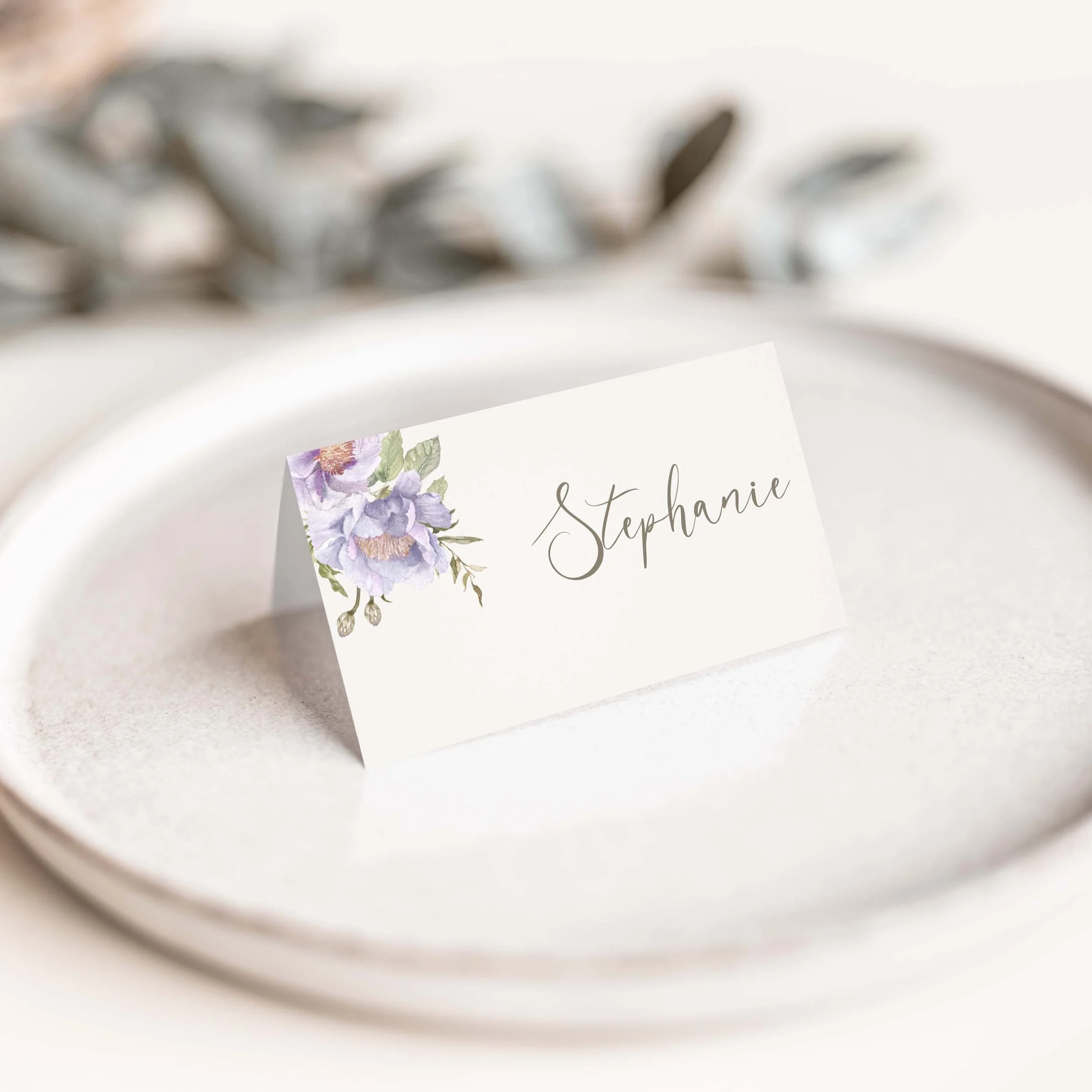Purple floral wedding place card with corner flower detail