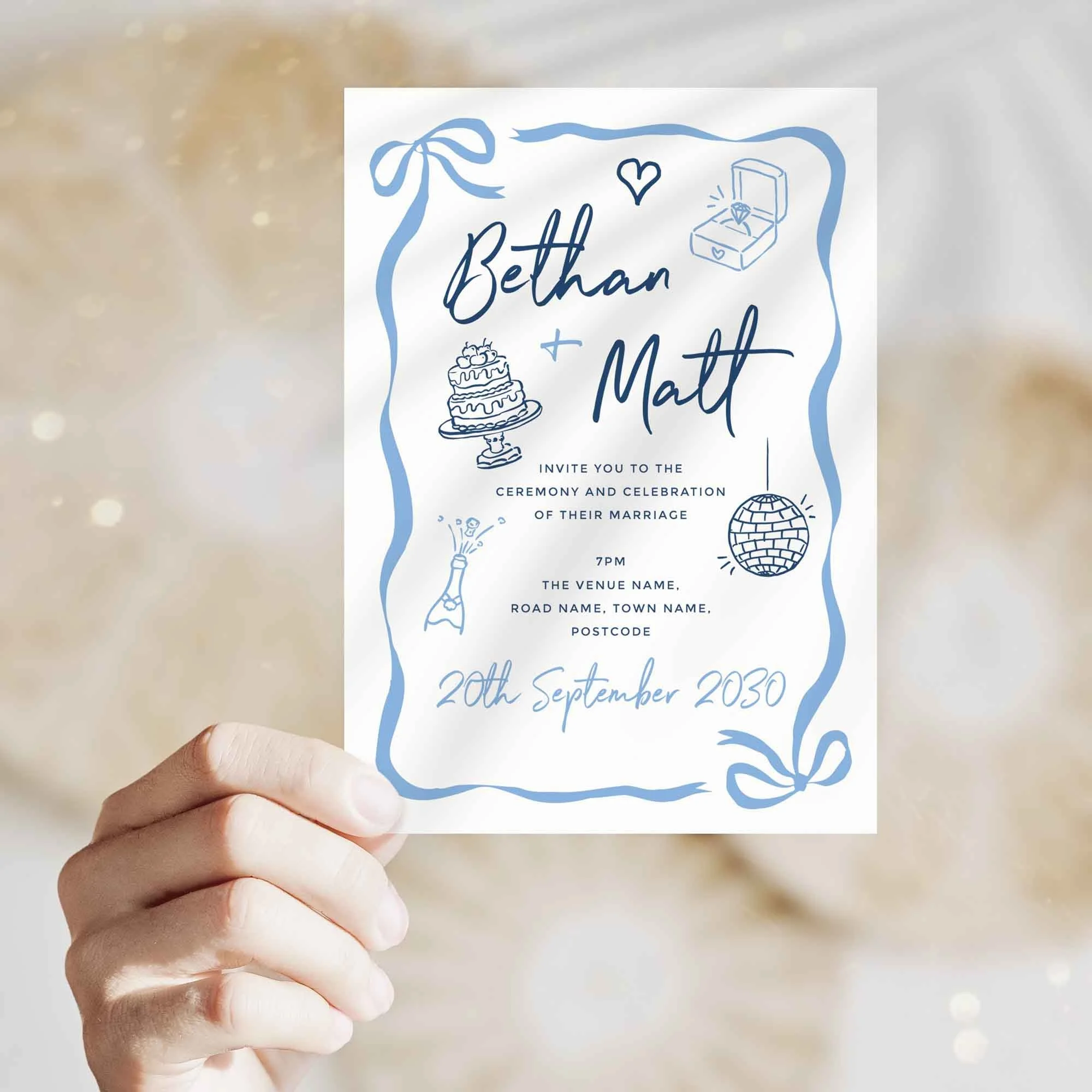 Hand holding Blue Doodle wedding invitation showing size and printed design details