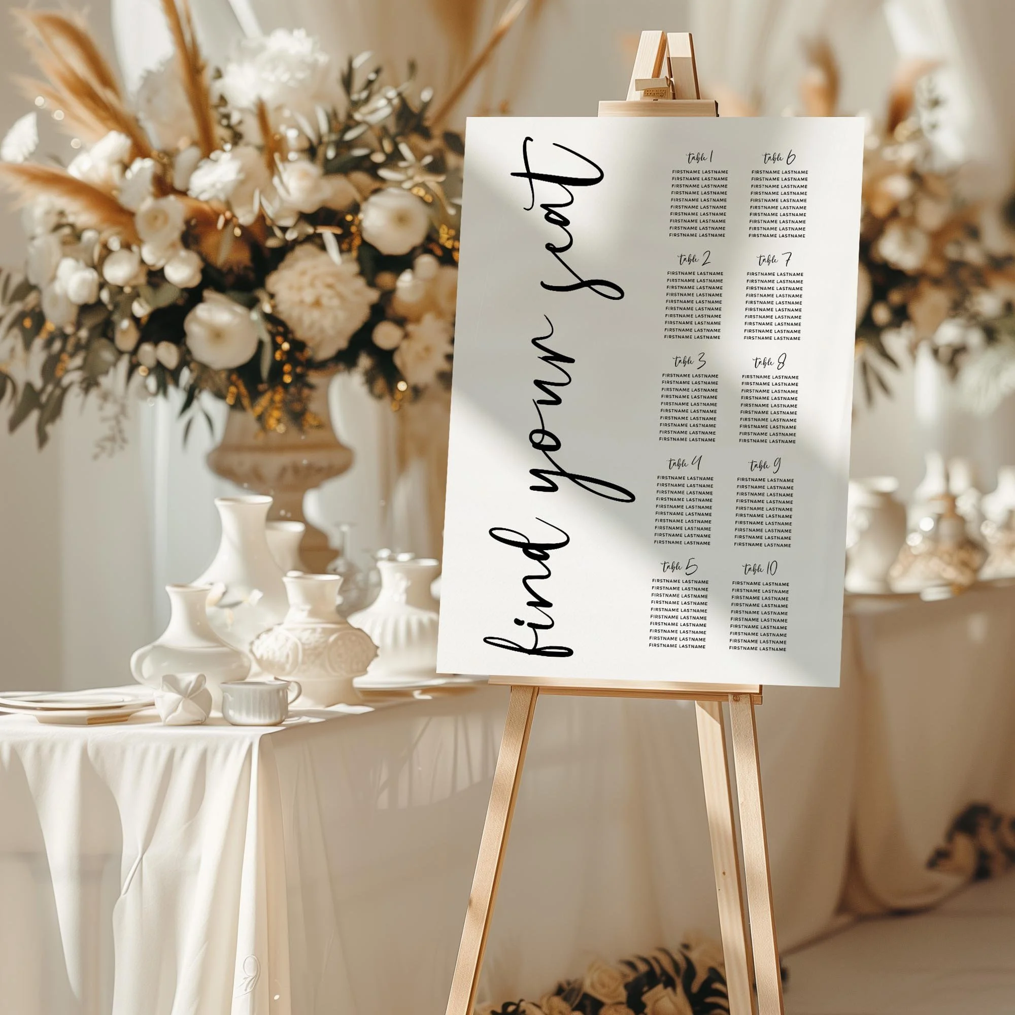 Black and White Calligraphy wedding seating chart sign with vertical calligraphy headings styled at a reception