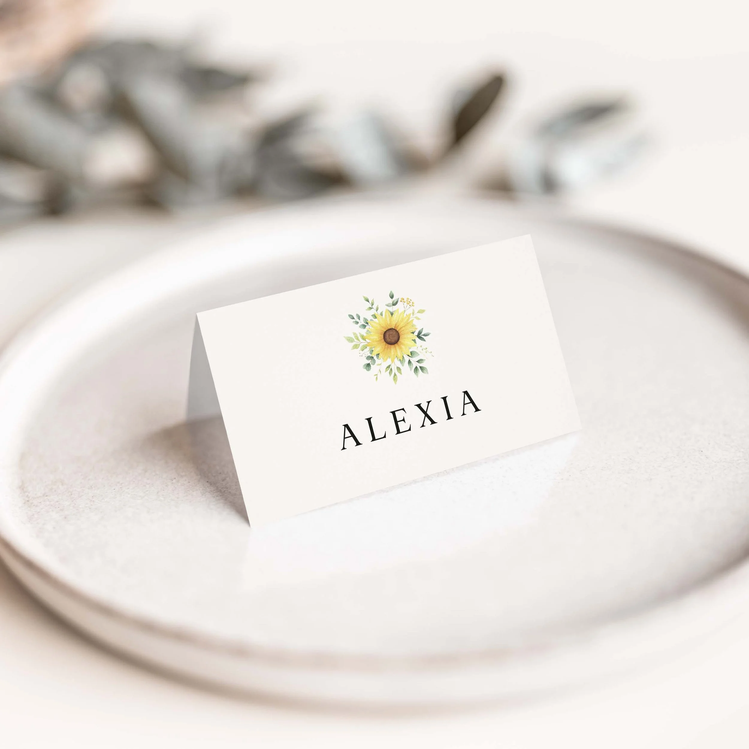 Sunflower Bouquet wedding place card with full sunflower botanical arrangement and calligraphy script guest name on luxury off-white card