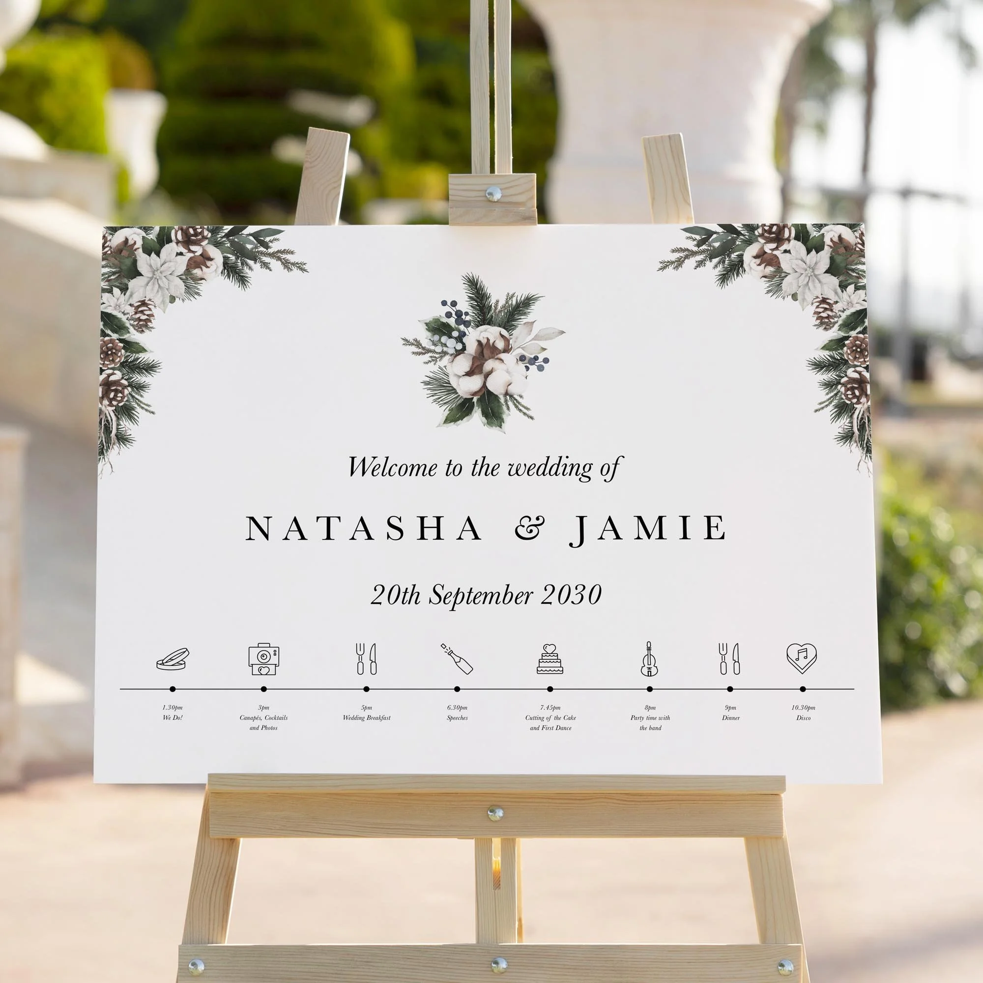 Winter Leaves and Cotton wedding welcome sign styled outdoors close-up