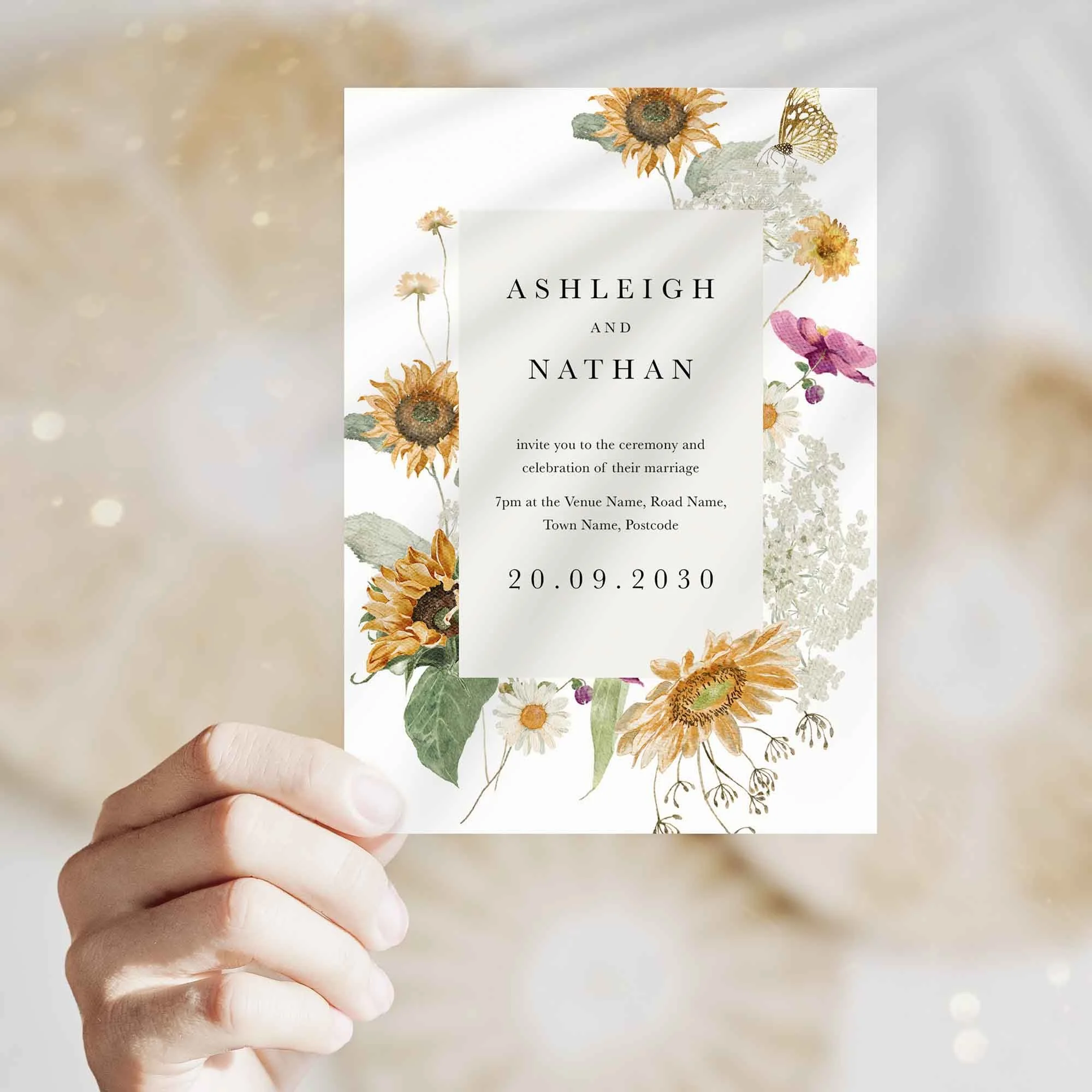 Hand holding Sunflower and Butterfly wedding invitation showing size and printed design details