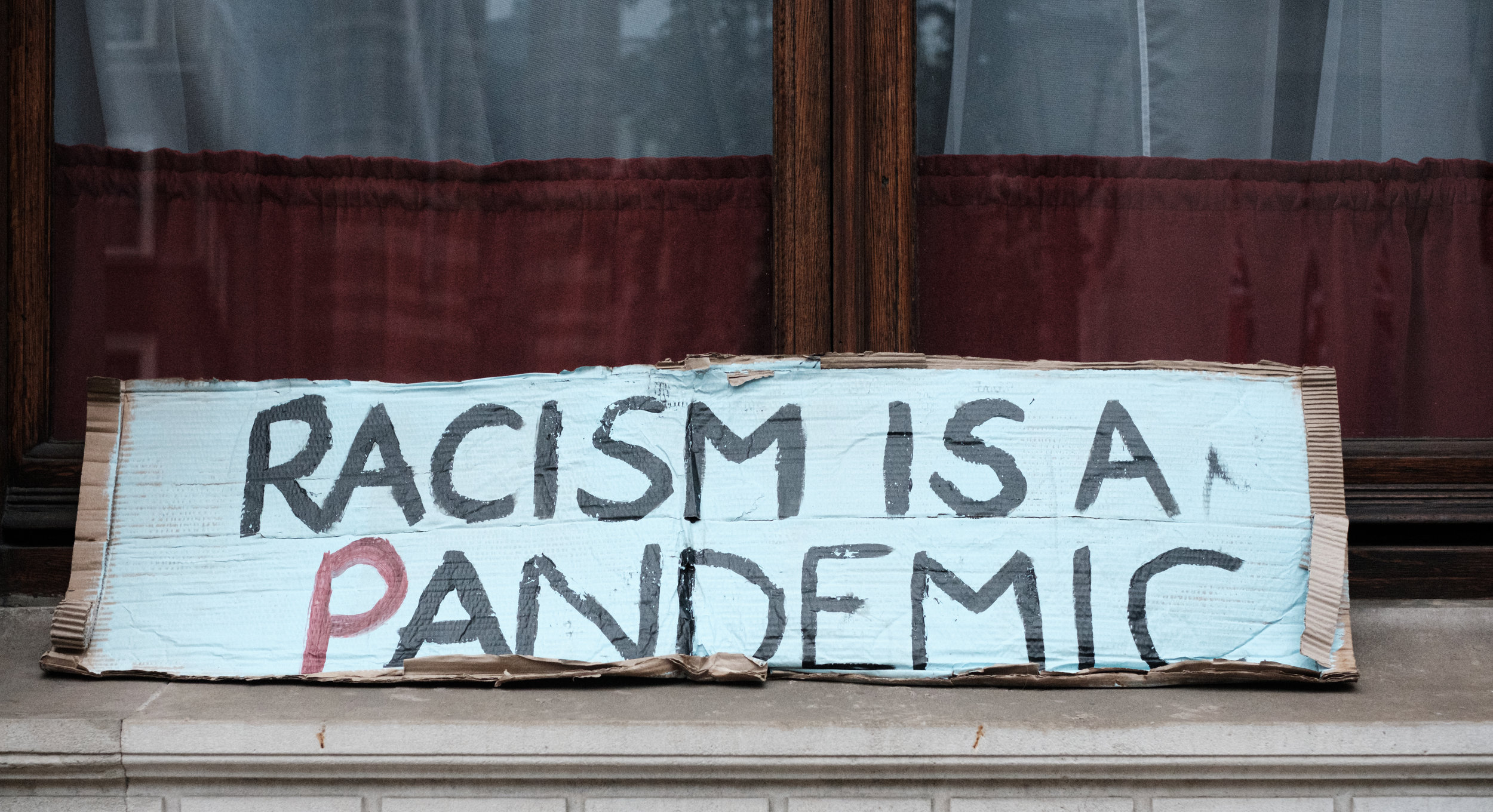 Toward a Cure: Cities Declare Racism a Public Health Crisis