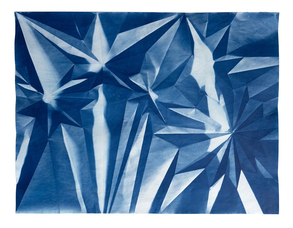   Folded Cyanotype  298, 2024  9.5 x 11 inches Cyanotype fluid on paper 