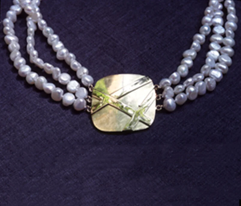  Fresh water pearls and 14k yellow gold 