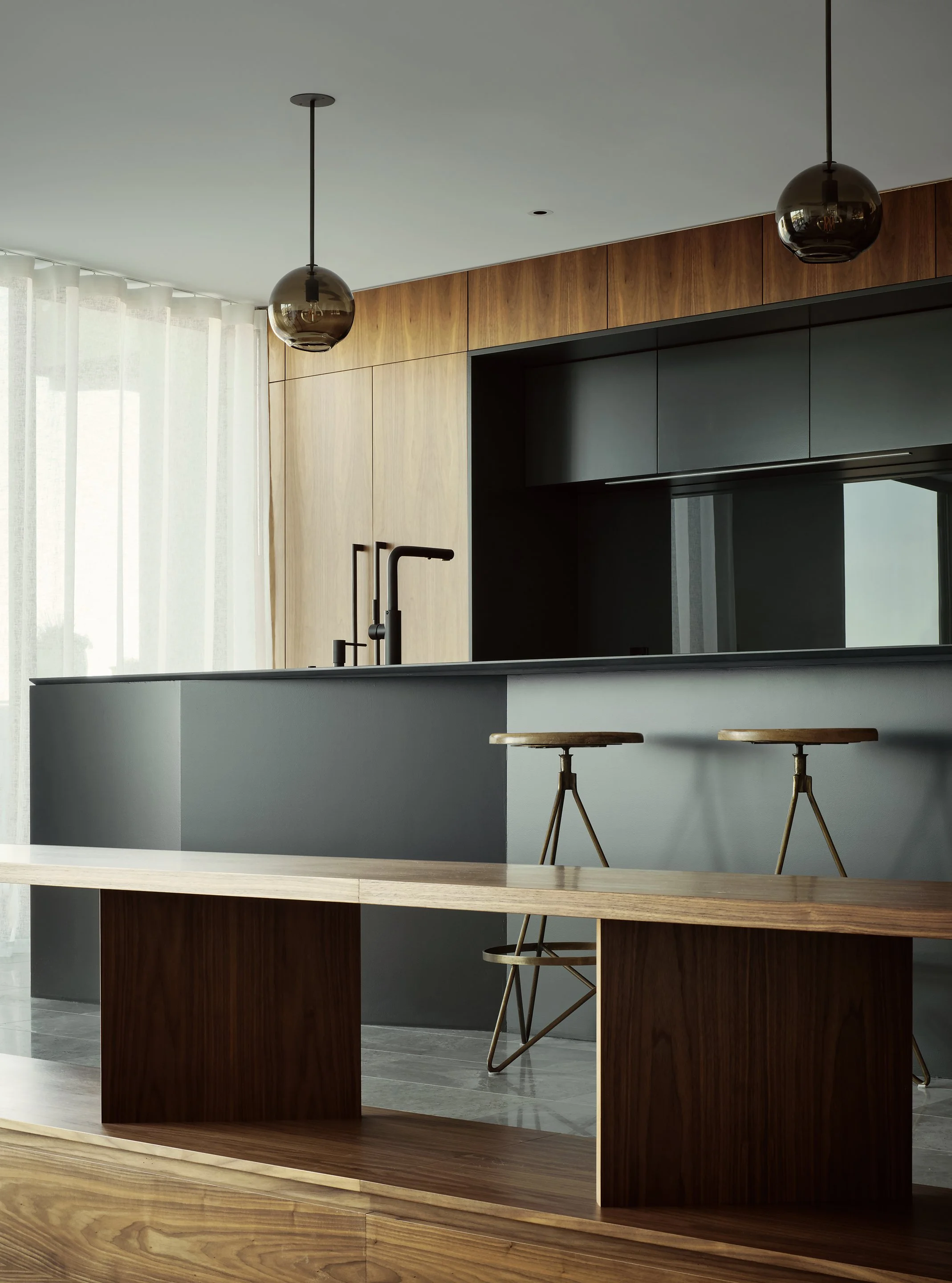 Interior Photography of Custom Made Chestnut Wood Bench, Cabinetry, and Steel Island at Middle Residence